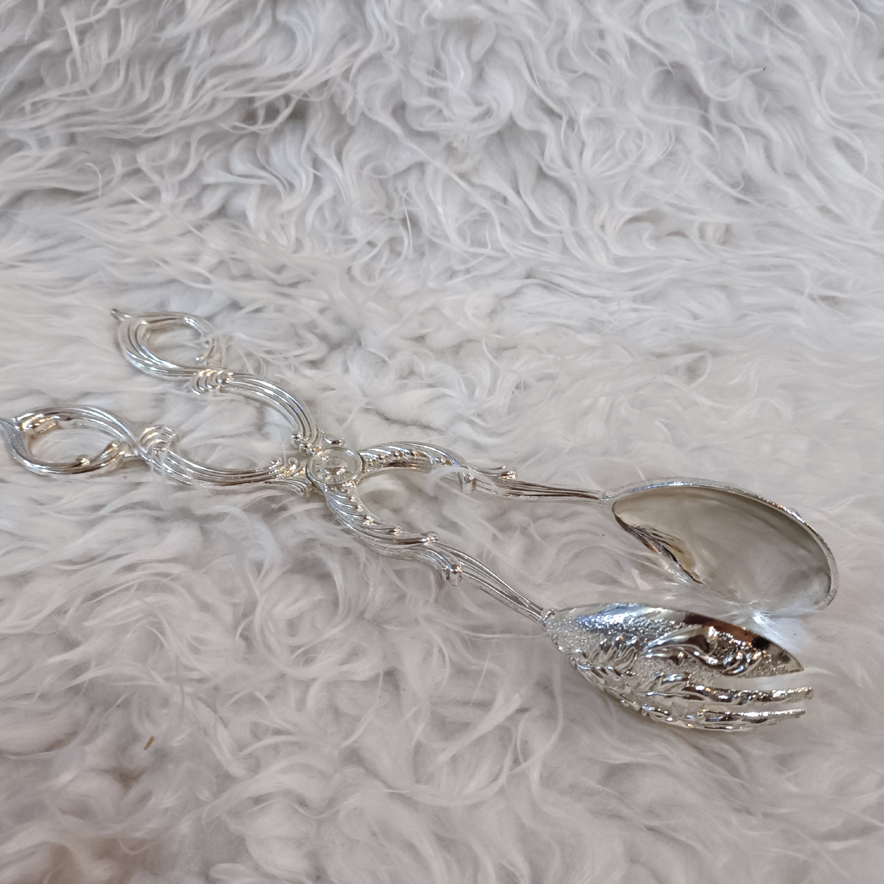 انبر سالاد پیوتر برند دیانا رنگ نقره ای طول حدود 24س 