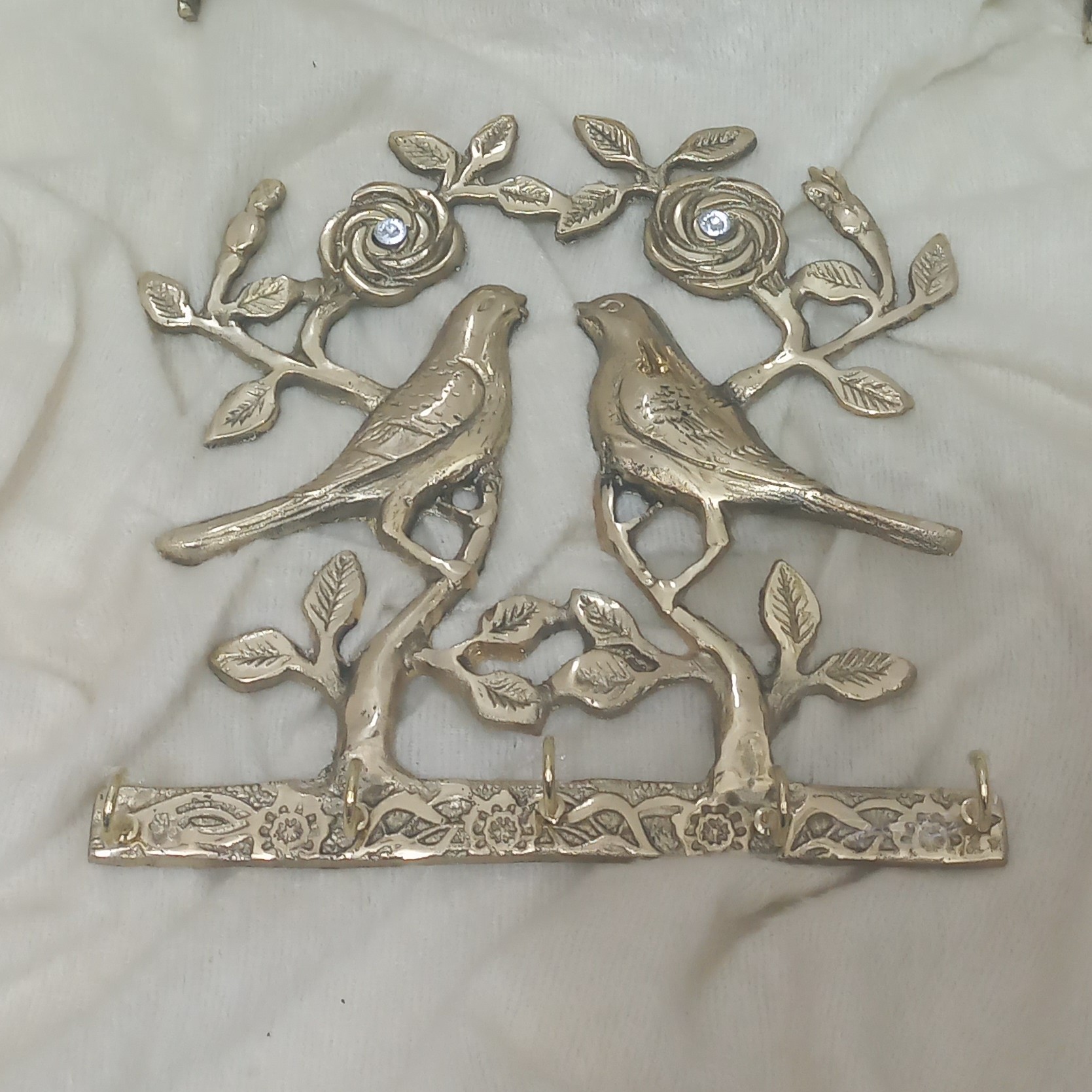 جا کلیدی برنز طرح گل و بلبل وجا حوله ست به وزن 1350گرم قیمت 940 ت ث000000