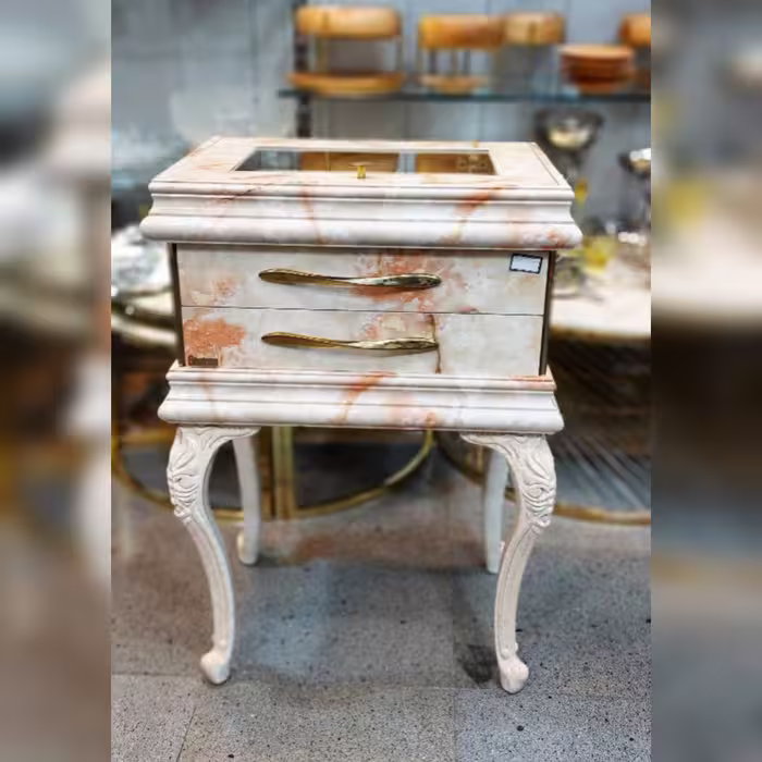 کنسول قاشق و چنگال طرح سنگ کشو ریلی رنگ کرم صورتی 