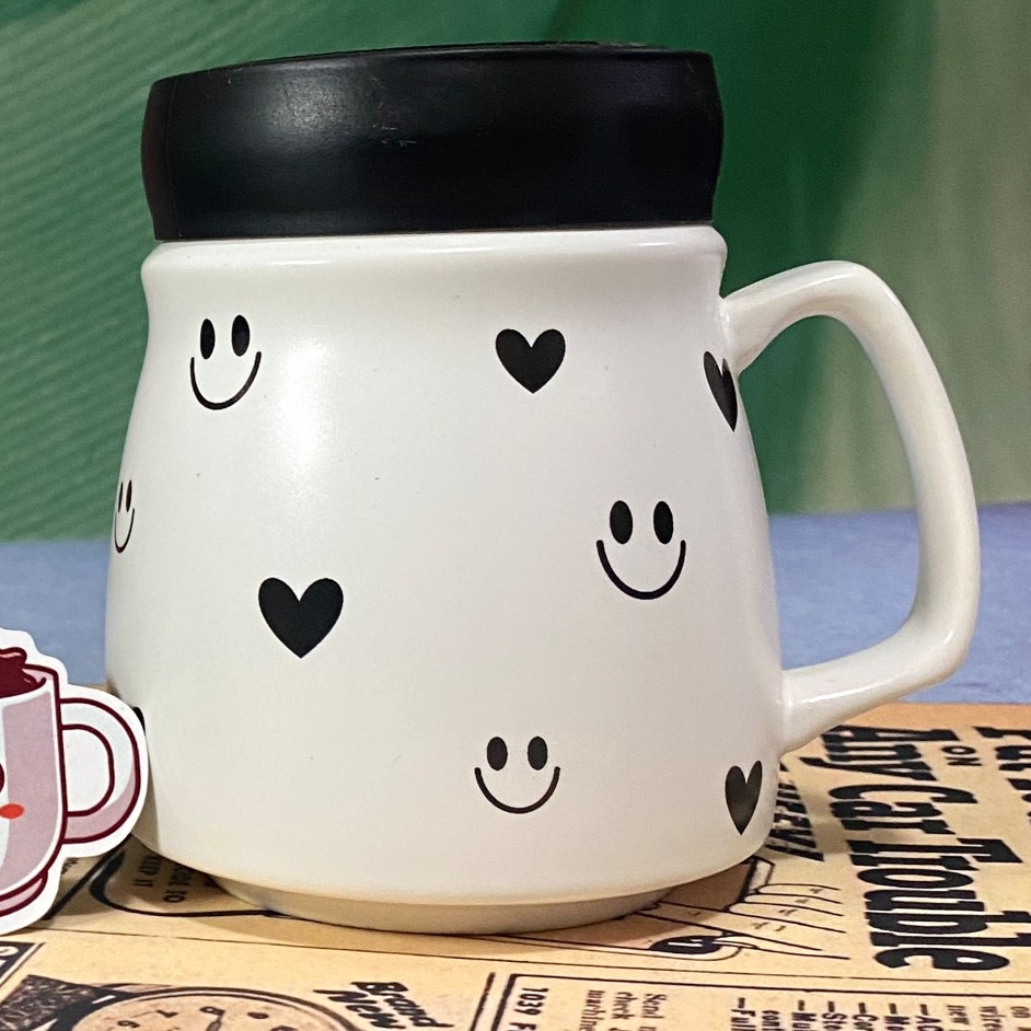 ماگ سرامیکی مدل درب آینه ای طرح ایموجی رنگ سفید 