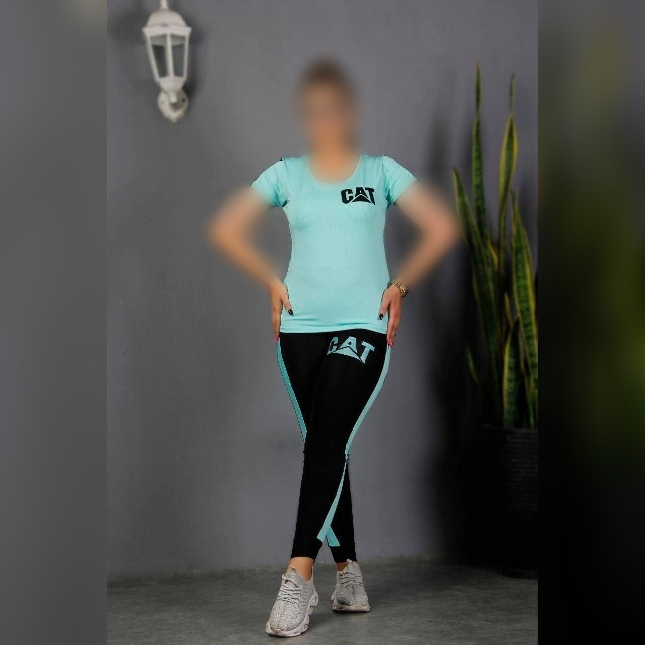 ست ورزشی ست باشگاهی ست بلوز و شلوار ورزشی زنانه جنس فلامنت اعلا فری سایز تا 44 مدل cat