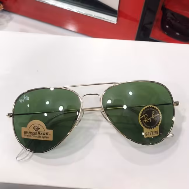 عینک آفتابی مردانه ریبن شیشه سبز.شیشه سنگ صورت خور زیبا