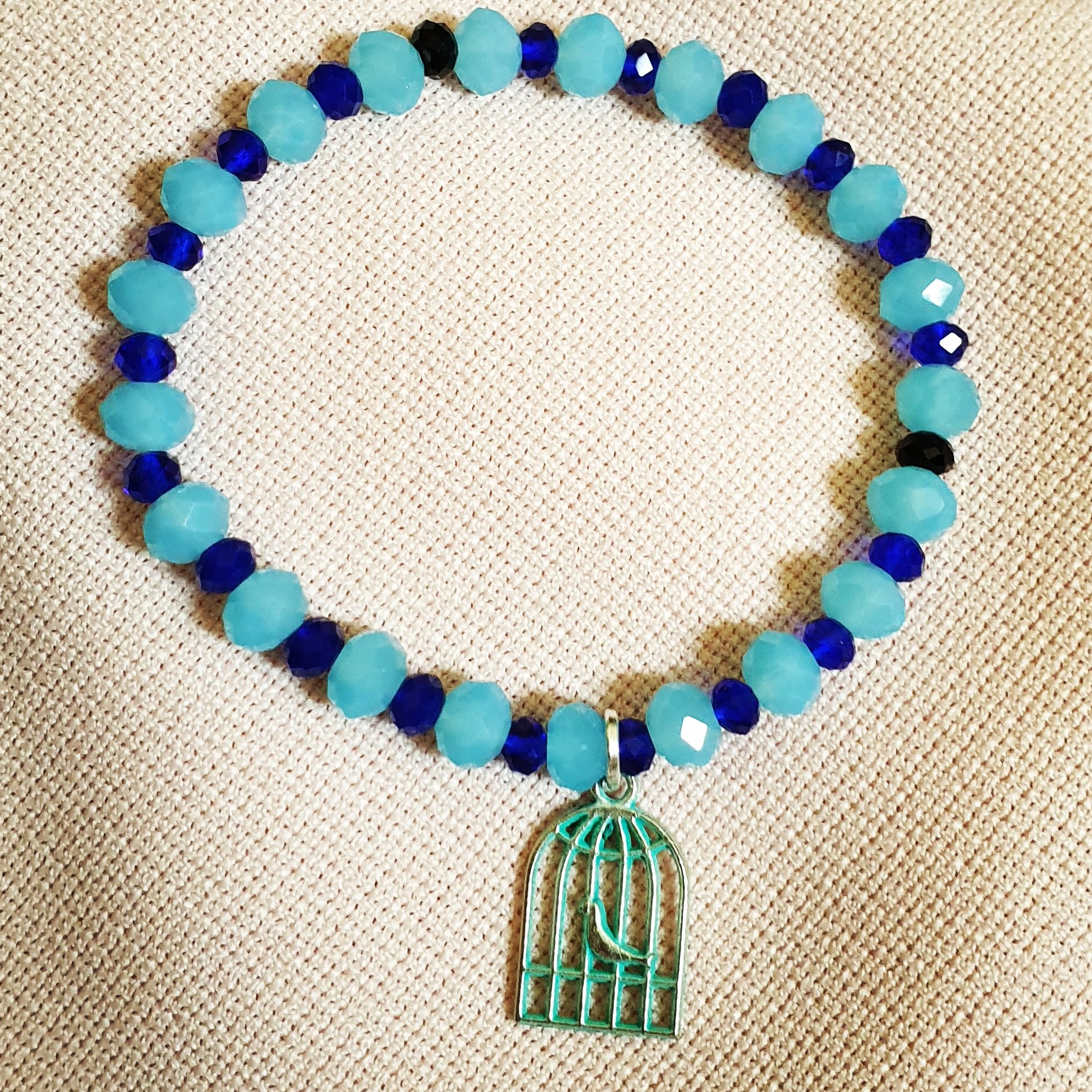 دستبند کریستال آبی سرمه ای مرغ آمین