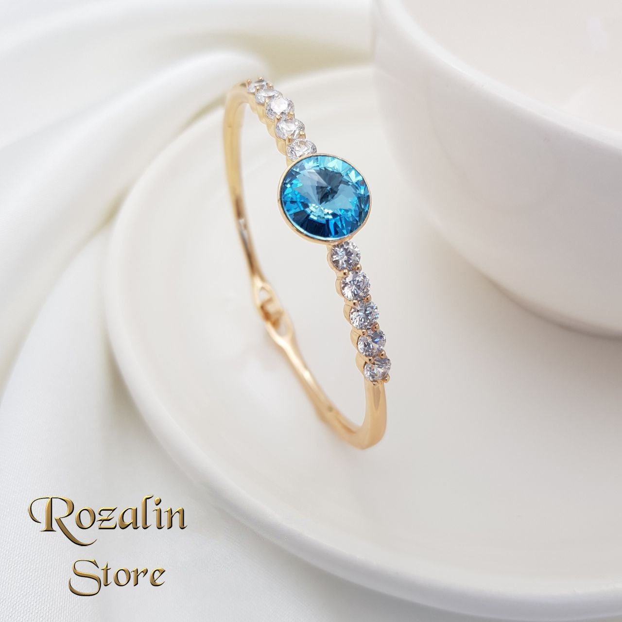 دستبند النگویی زنانه ژوپینگ نگین سواروسکی آبی

