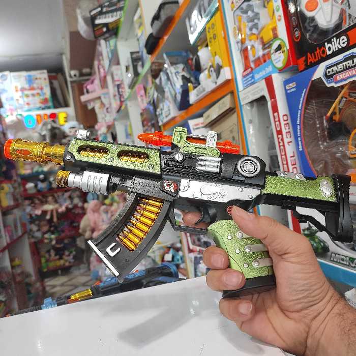 اسباب بازی تفنگ موزیکال حرکت  دار خارجی همراه فیلم عملکرد