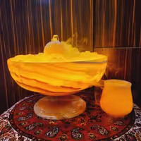 آبنما سنگ مرمر پایه دار به رنگ پرتقالی با گوی مرمر به همراه مه ساز