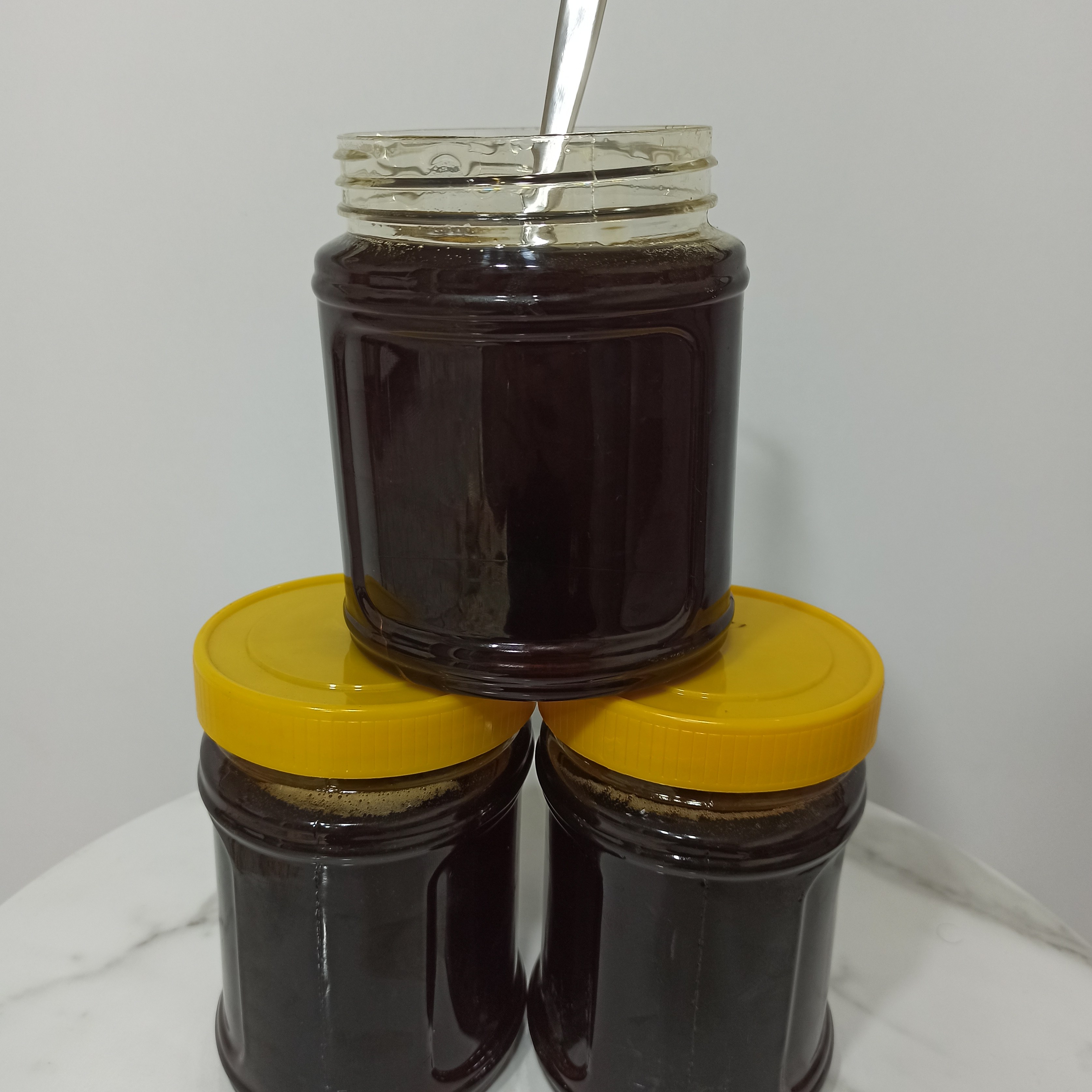 شیره عسلی خانگی ملایر 1 کیلویی کاملا ارگانیک 