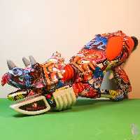 تفنگ آبپاش طرح دانیاسور سرگرمی هیجان انگیز تابستون ابعاد حدودا 15 در 35 سانتیمتر قدرت پرتاب آب زیاد