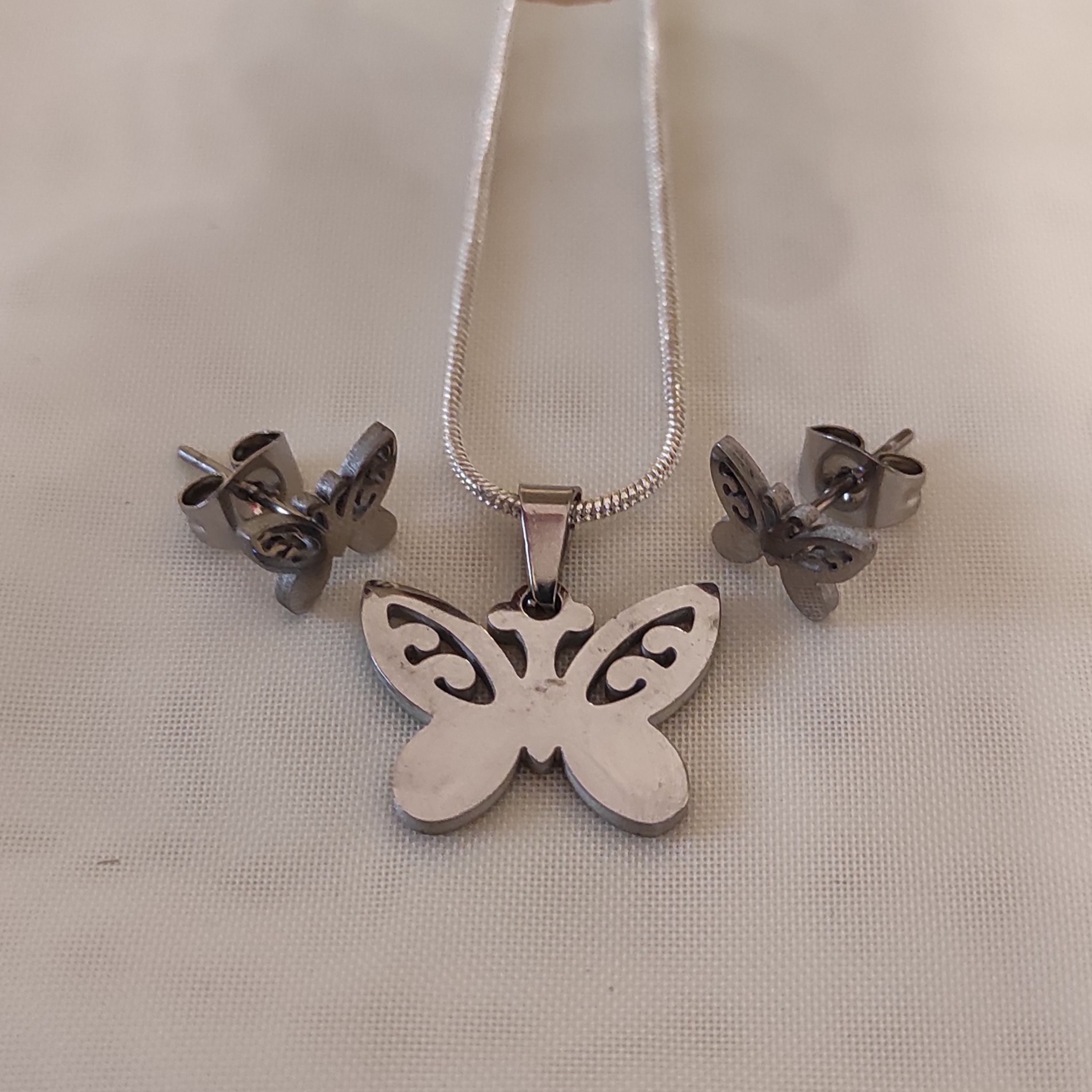 نیم ست استیل طرح پروانه نقره ای کوچک