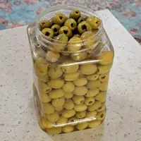 زیتون بی هسته  ویژه درشت و گوشتی و ترد و یکدست  اصیل طارم 900گرم آبکش و خالص مامین