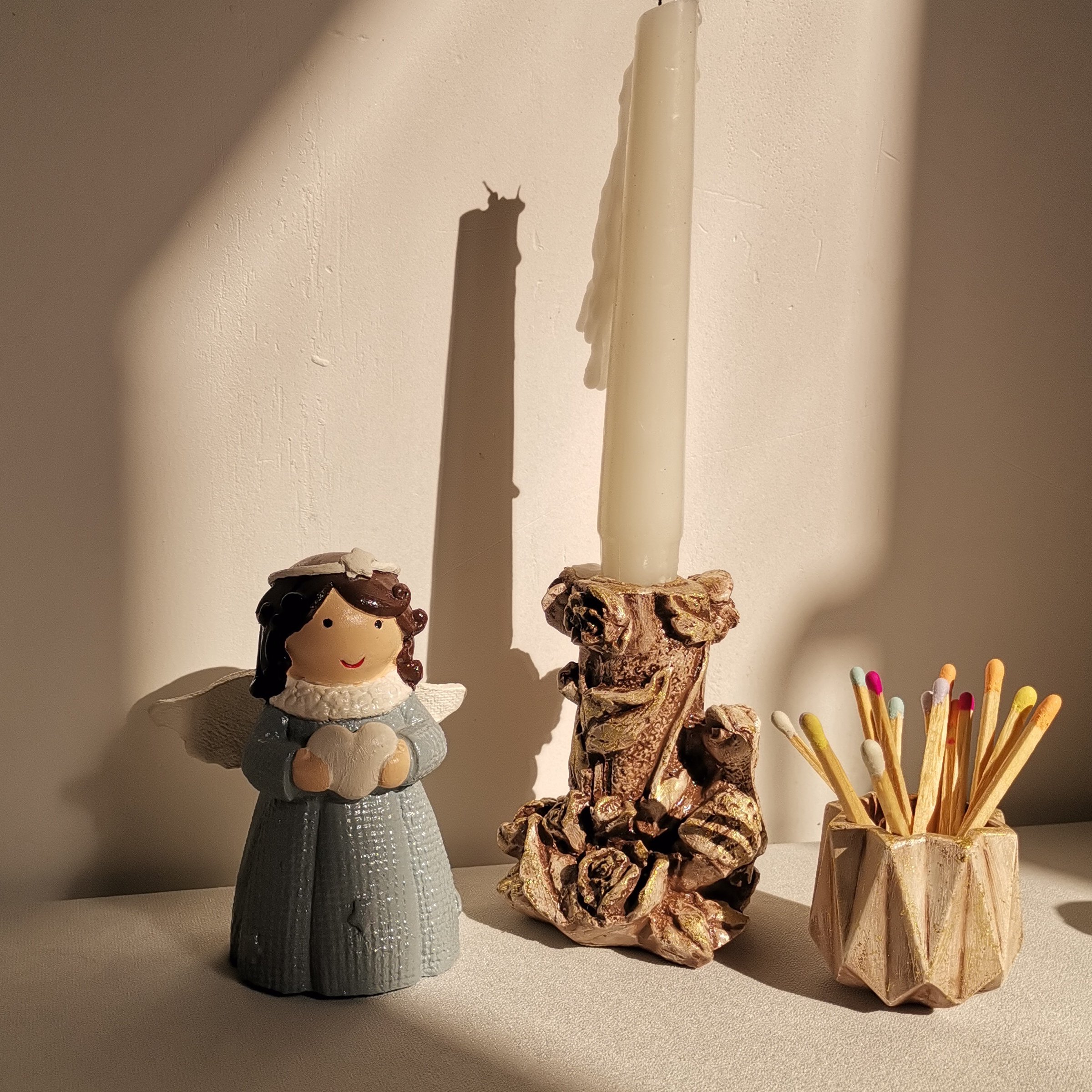 مجسمه ی یک عددجاشمعی طرح پرنده به همراه جاکبریتی ویک عددفرشته بالدارمناسب تزئین ودکور