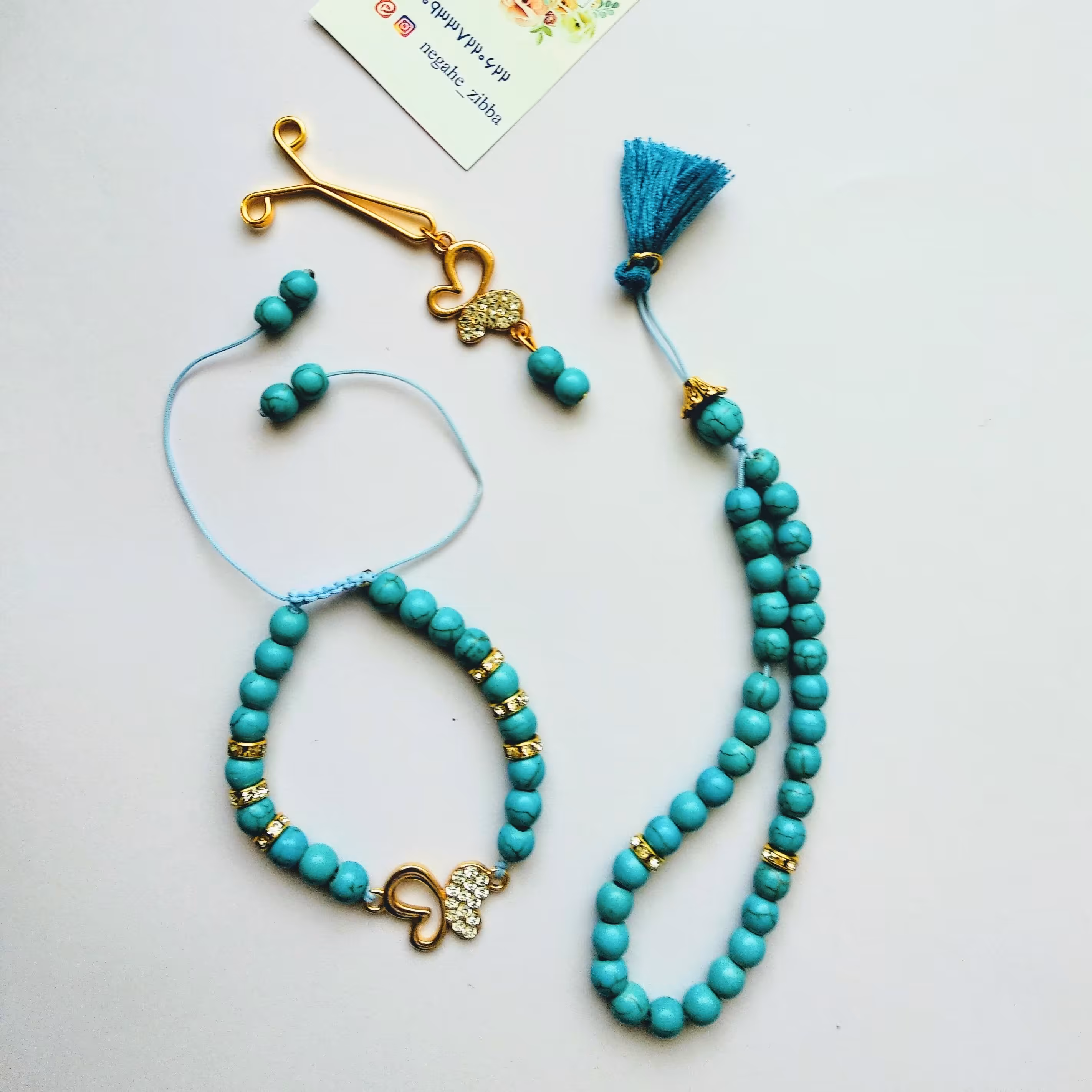 ست دستبند و گیره روسری و تسبیح هستی فیروزه ای