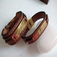 دستبند چرم طبیعی  با پلاک استیل 