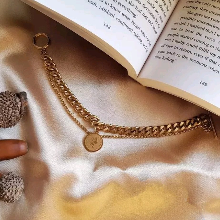 دستبند کارتیر و سکه الیزابت و قفل تی استیل