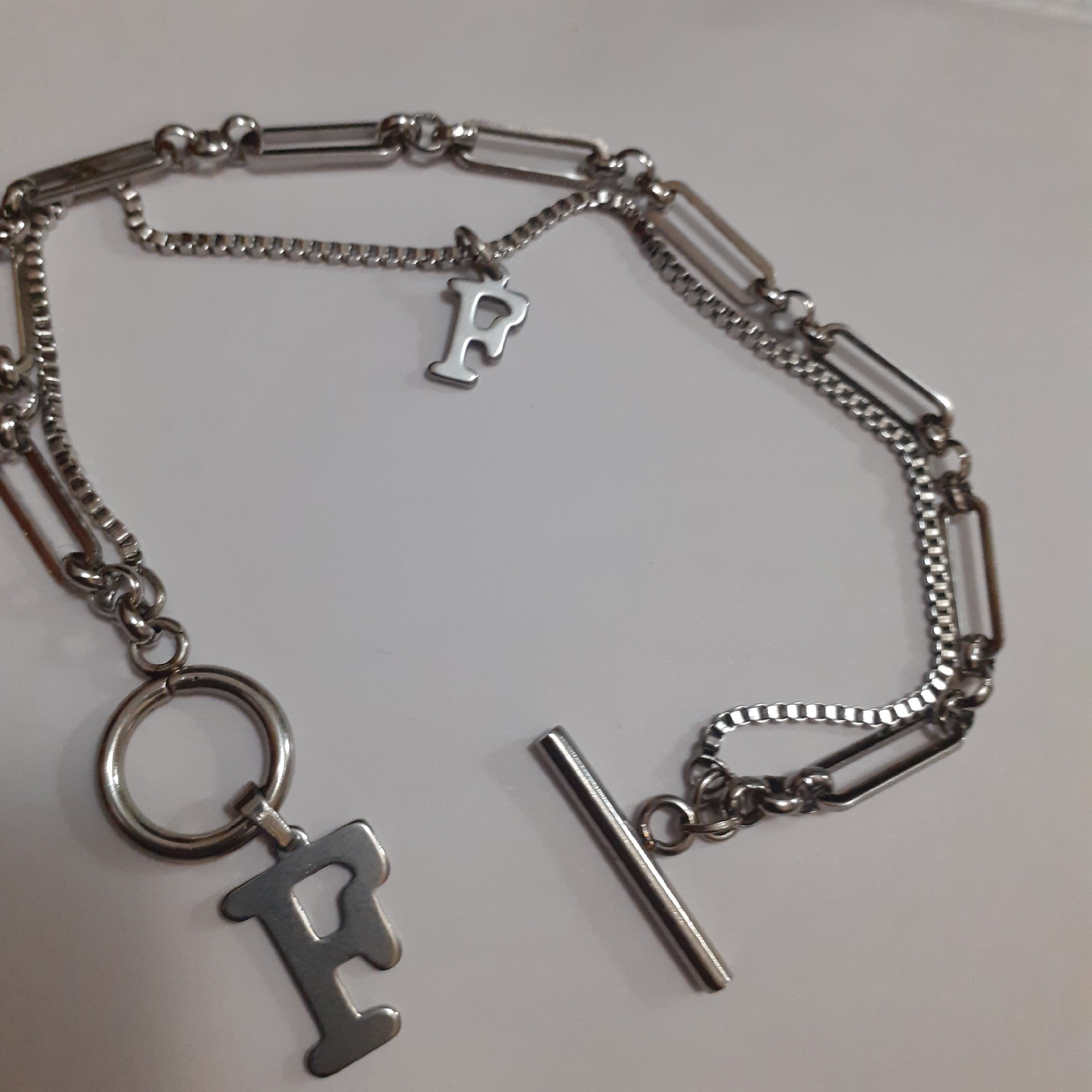 دستبد دوردیفه  تمام استیل با حروف لاتین کد 6767