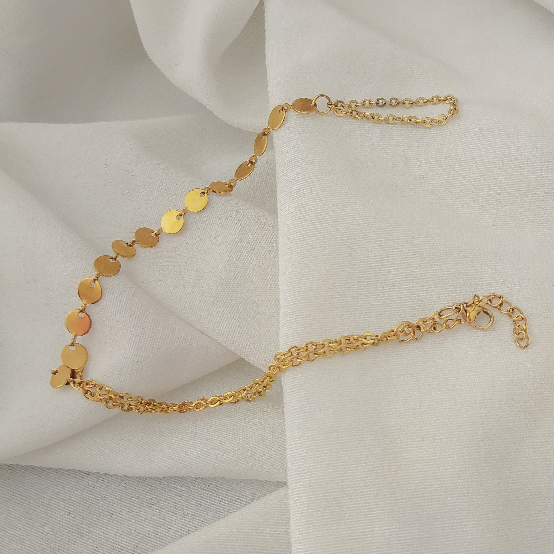 دستبند تمیمه سکه ای استیل موجود در دو رنگ گلد و سیلور