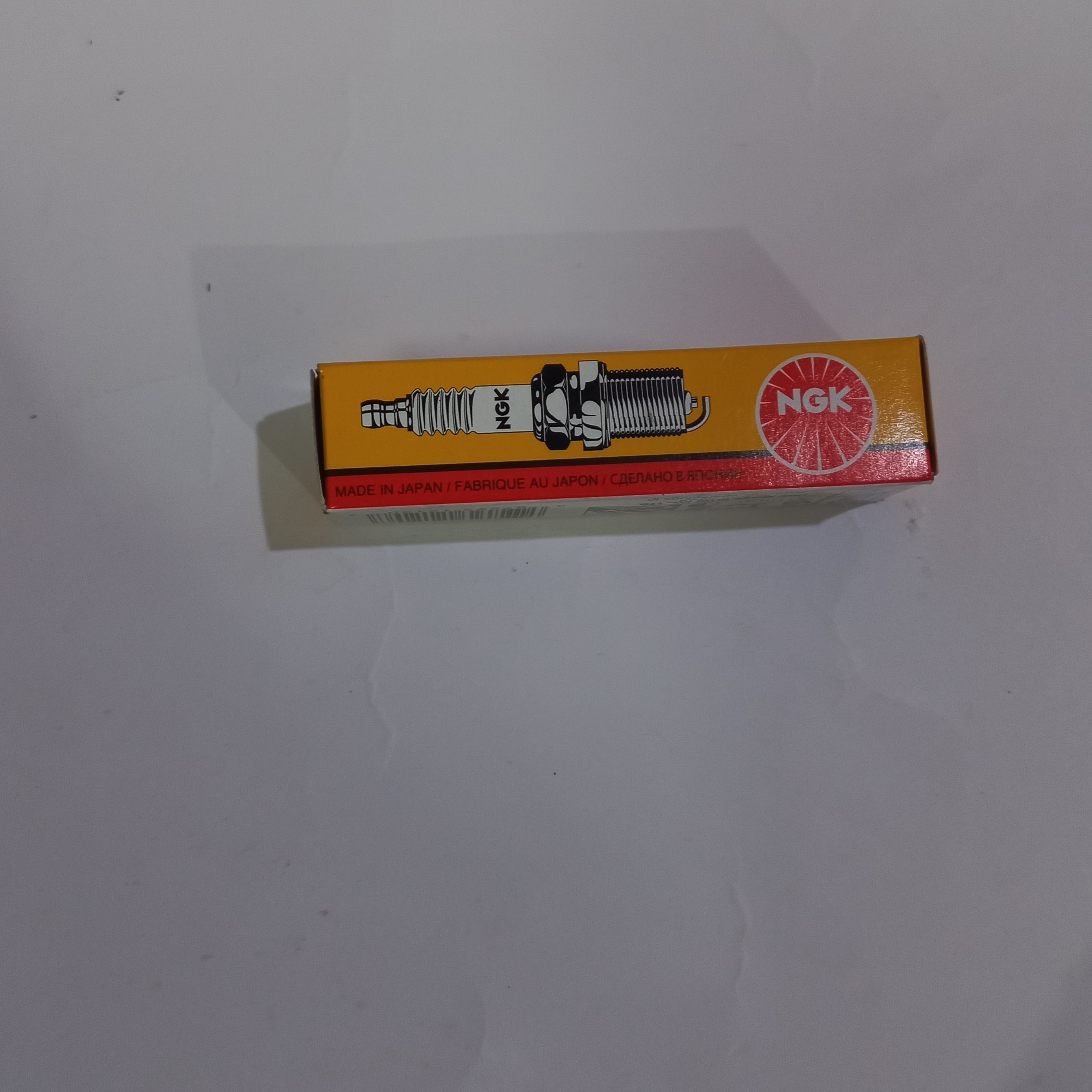 شمع موتور سیکلت  هندا 125  ان  جی کی وزن 300  گرم 