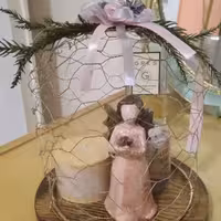 مجسمه فرشته و پرنده به همراه شمع تزئینی