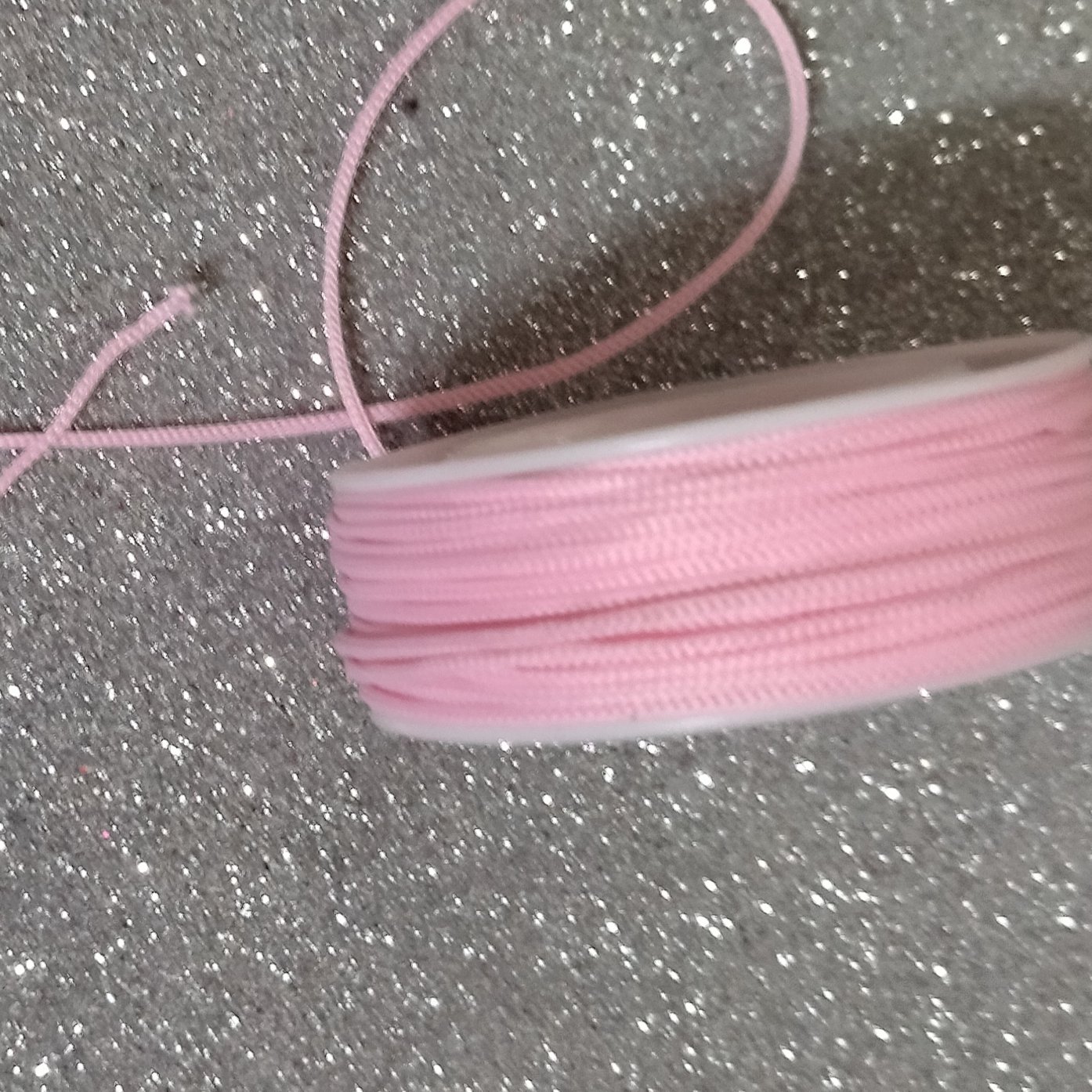 نخ دستبند صورتی روشن(قیمت برای5متر)