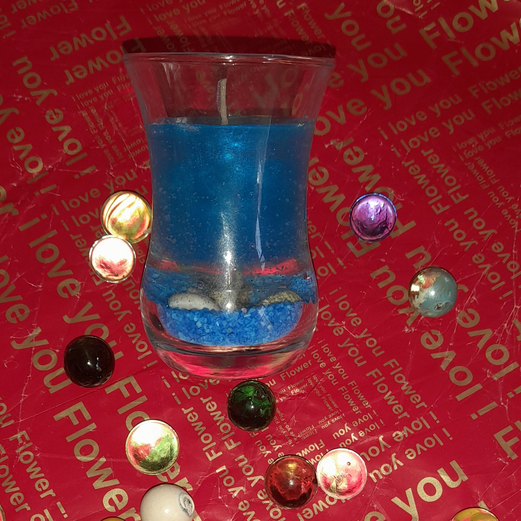 شمع لیوانی مدل دریایی تیره