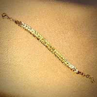 دستبند استیل رنگ ثابت دو زنجیر ترکیب ساده و گندمی طلایی رنگ