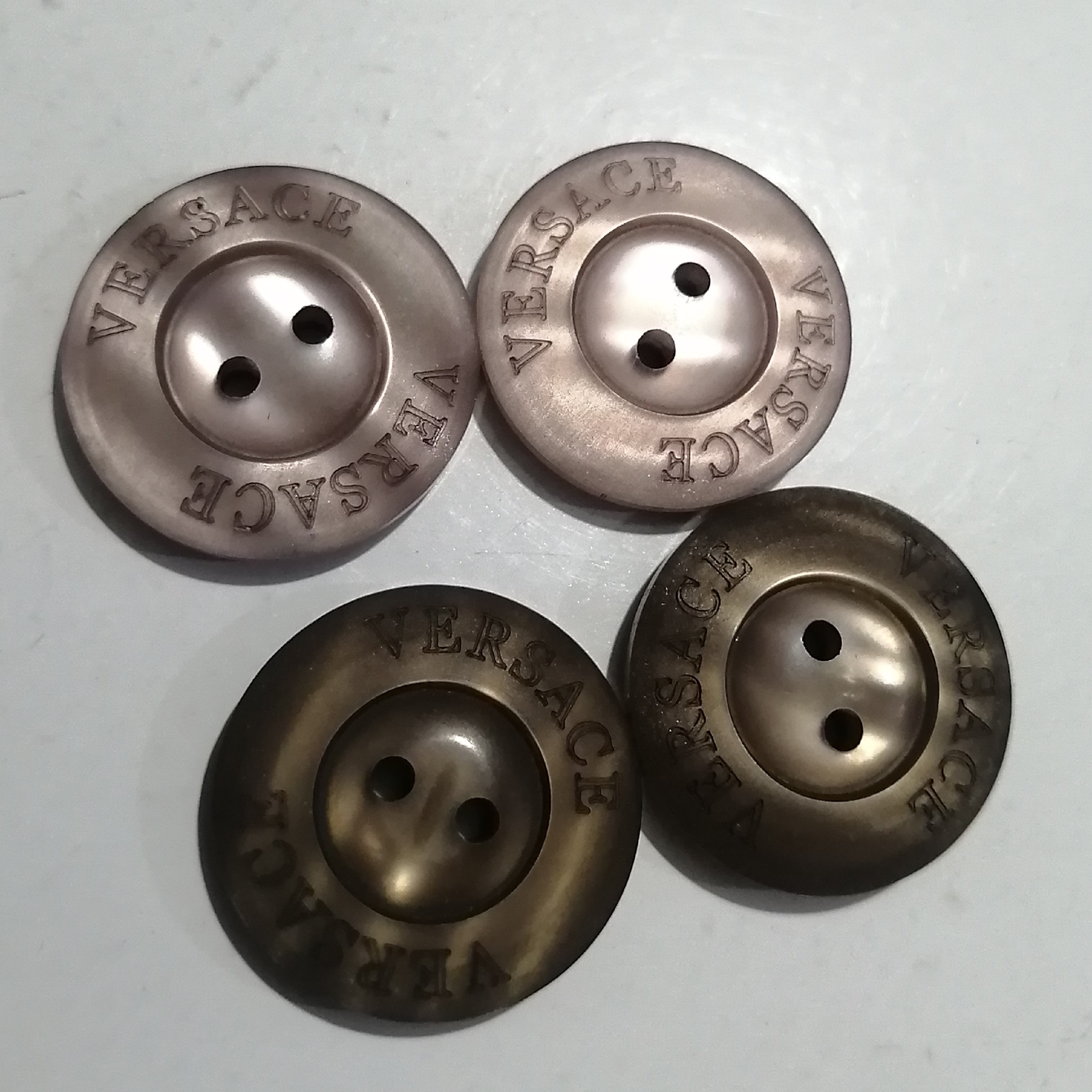 دکمه لباس طرح دایره در دورنگ و بسته 4 عددی 