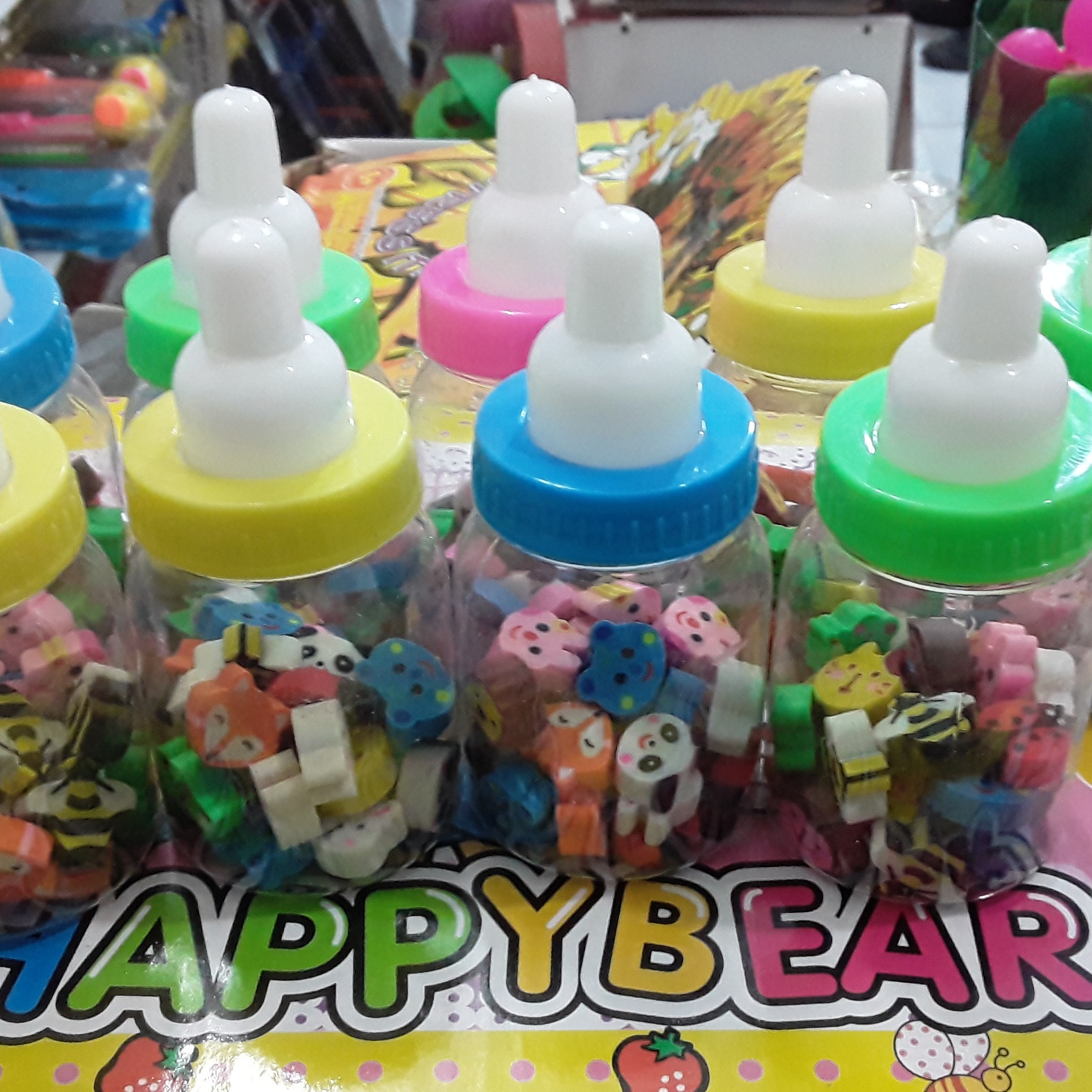 پاک کن ریز فانتزی با شکل های متنوع و جالب در بسته بندی شیشه شیر