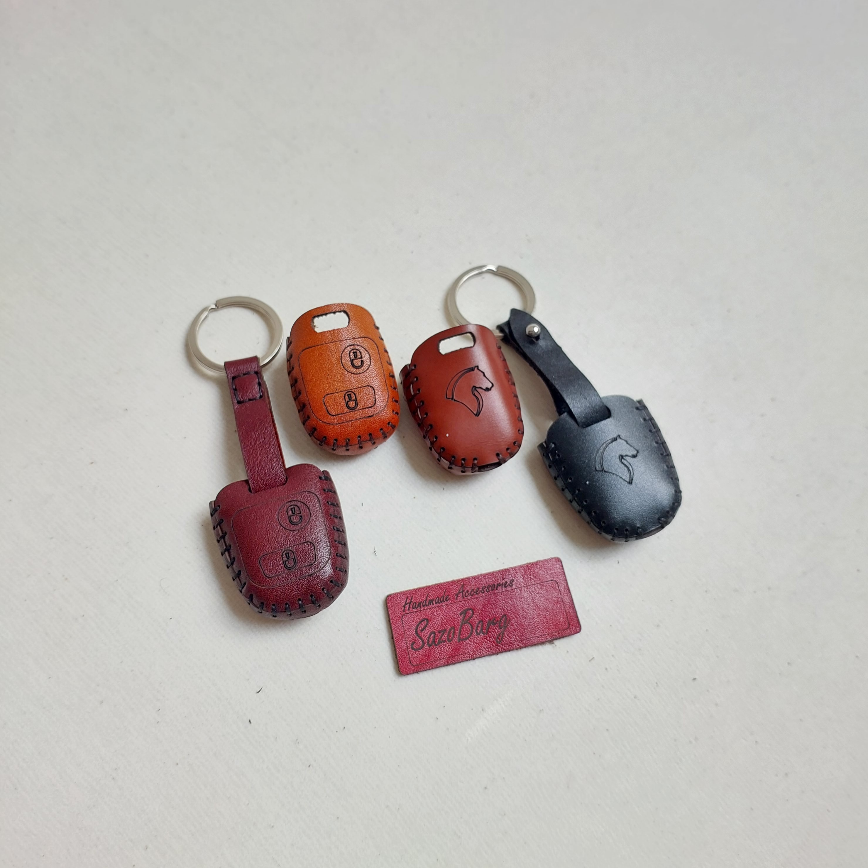 جاسوئیچی چرمی رانا کاور ریموت سوییچ چرم طبیعی رانا (دو کلید) روکش چرم کلید خودرو