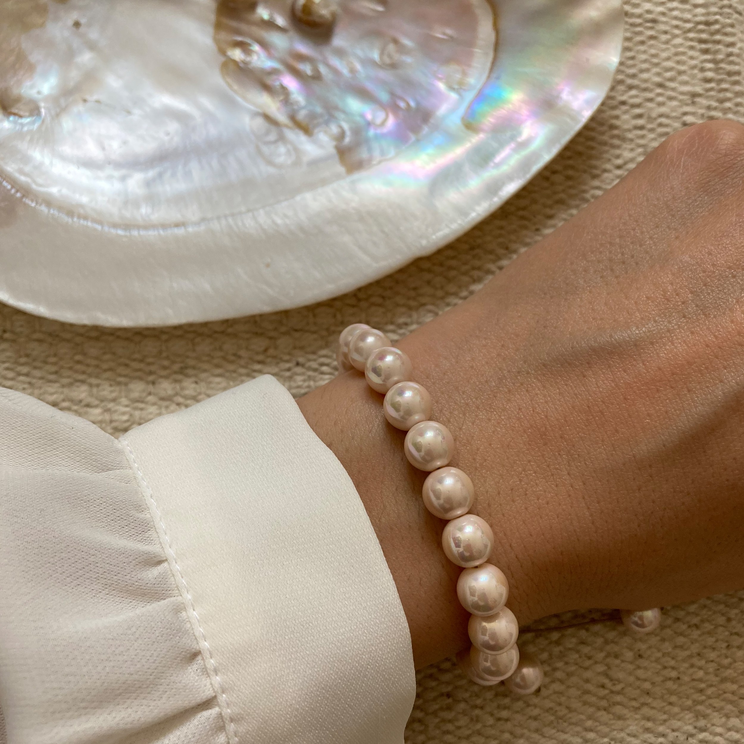 دستبند مروارید شل صورتی رنگ سایز 8 میلیمتر کیفیت درجه یک