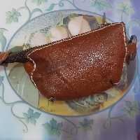 کیف  کوچک کمکی چرم طبیعی بز دست دوزقهوه ای مکعب مستطیل باحلقه آویز درابعاد6در3در7سانتیمتر