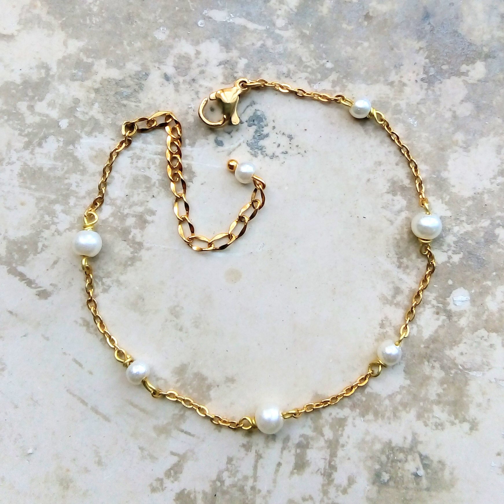 دستبند زنجیر مرواریدی زیبا رنگ ثابت