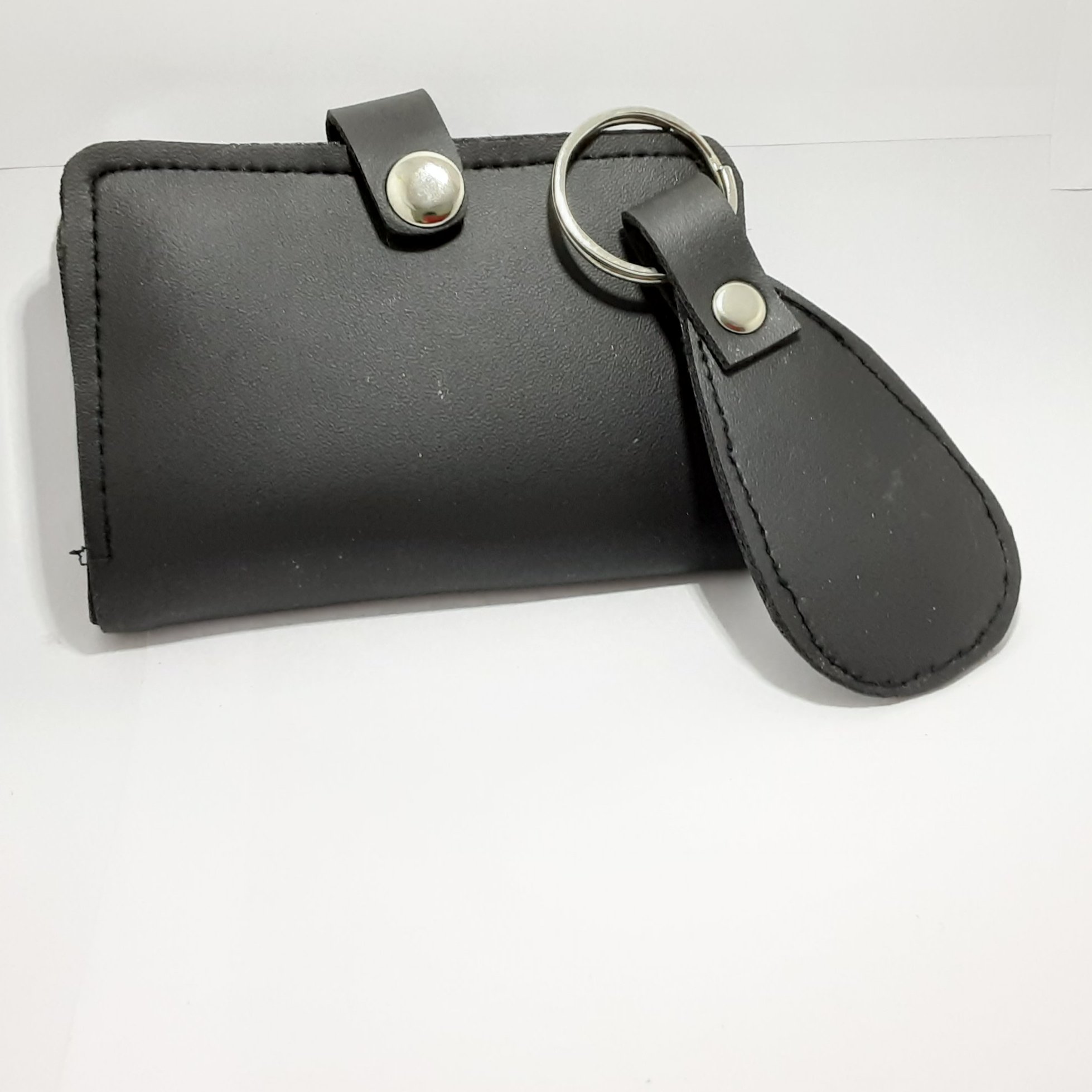 جا کارتی با جا کلیدی چرم مصنوعی و وزن 60 گرم