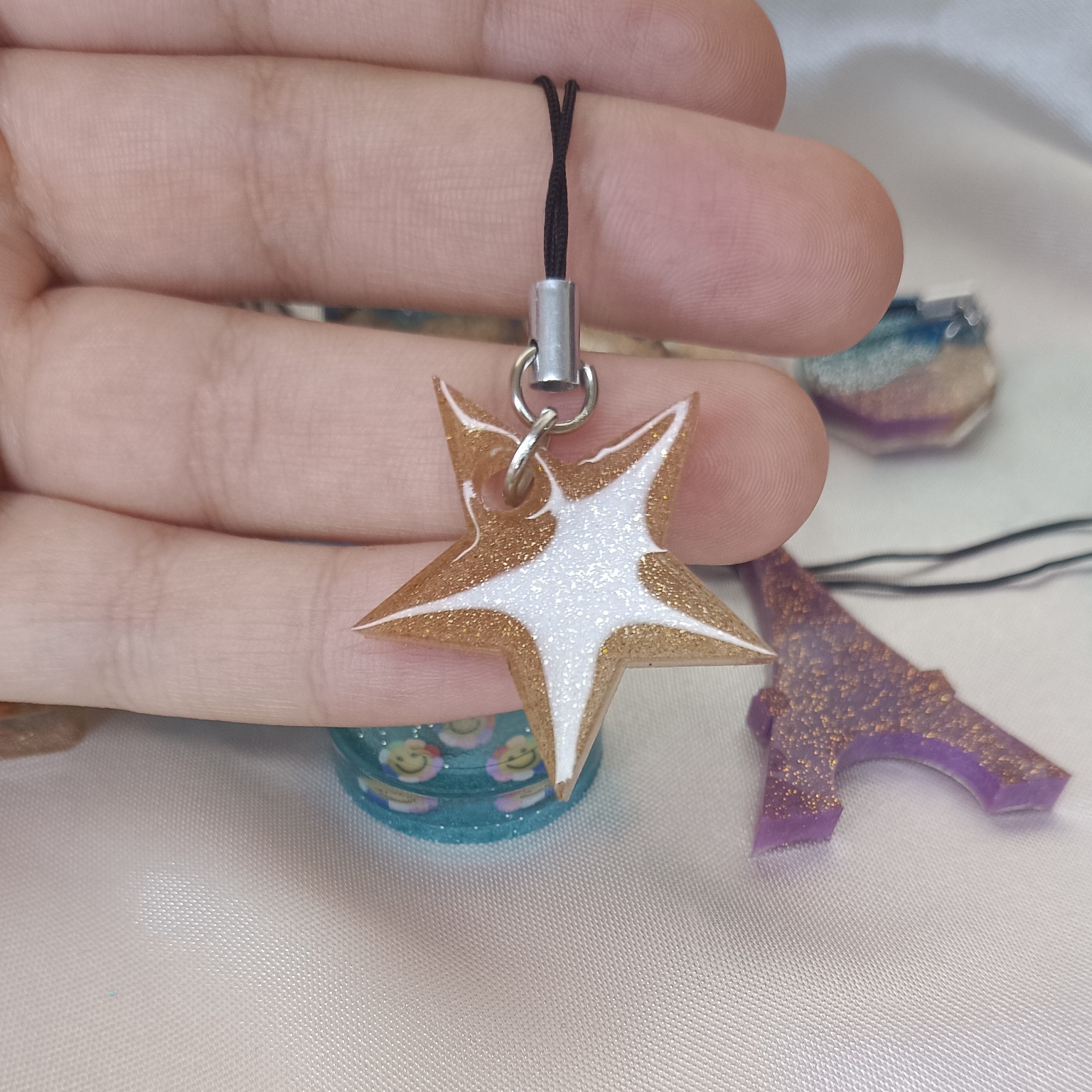 آویز موبایل رزینی طرح ستاره 