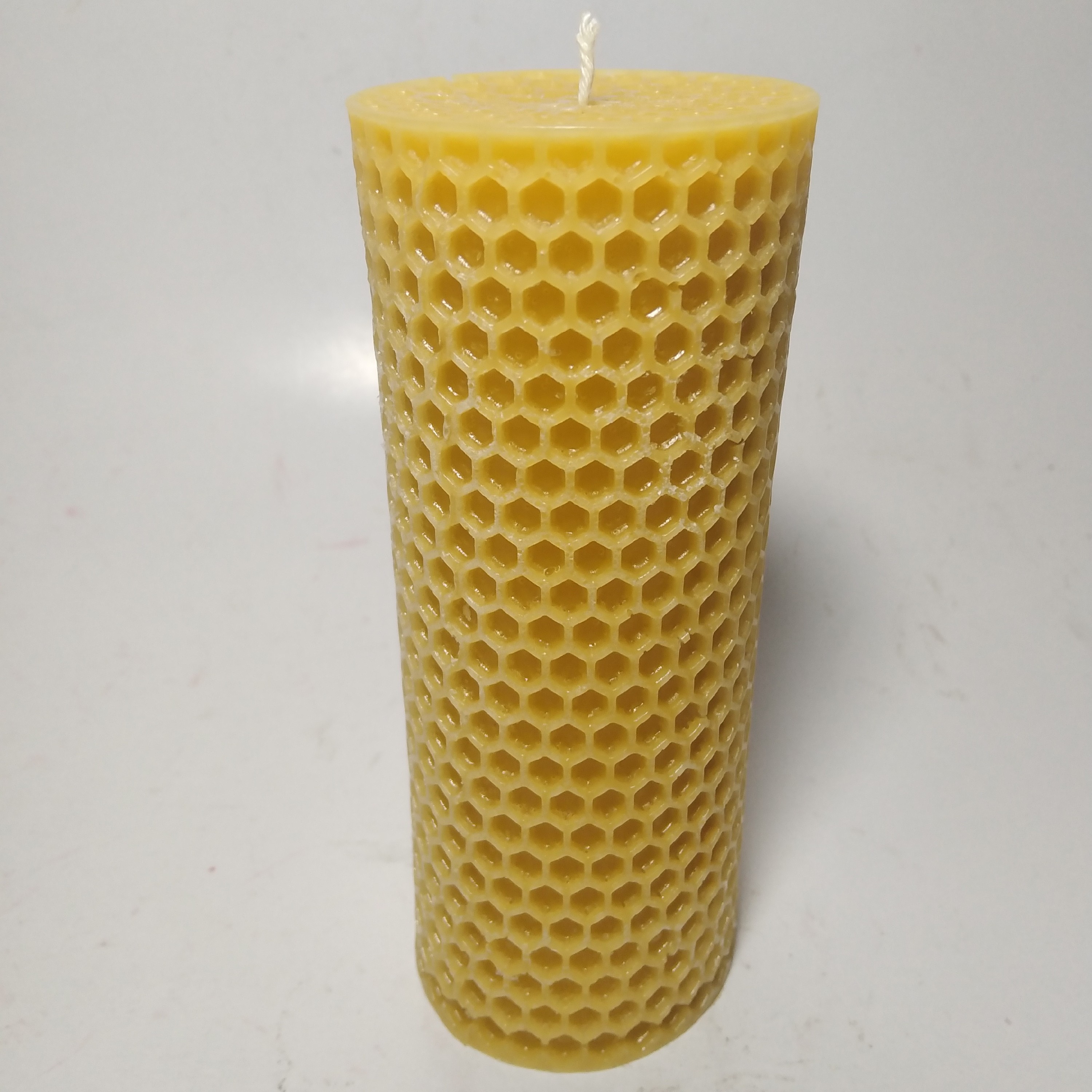 شمع استوانه مدل کندو(7پرتو)معطر،رنگ کرم