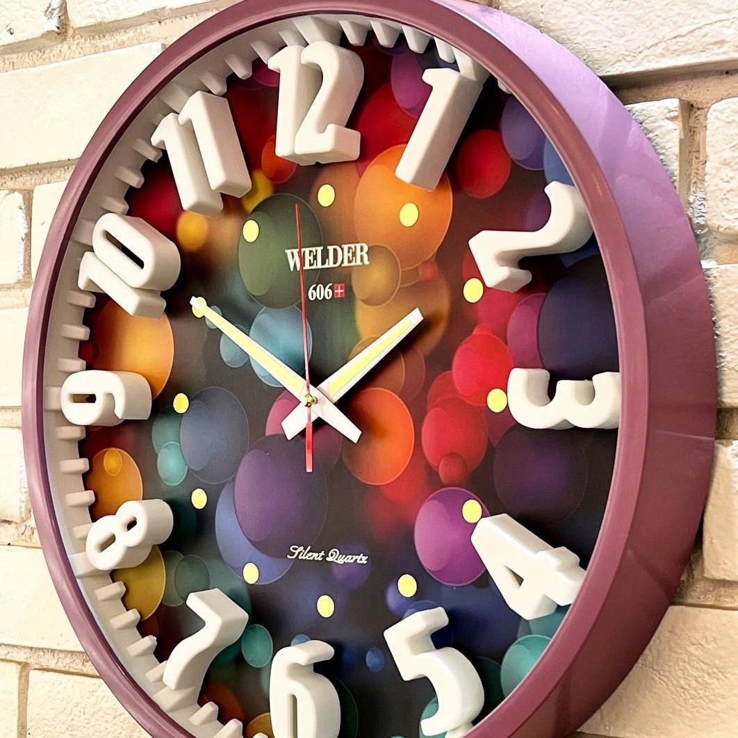 ساعت دیواری برند WELDER پاستیلی طرح فانتزی صفحه رنگی شبنما