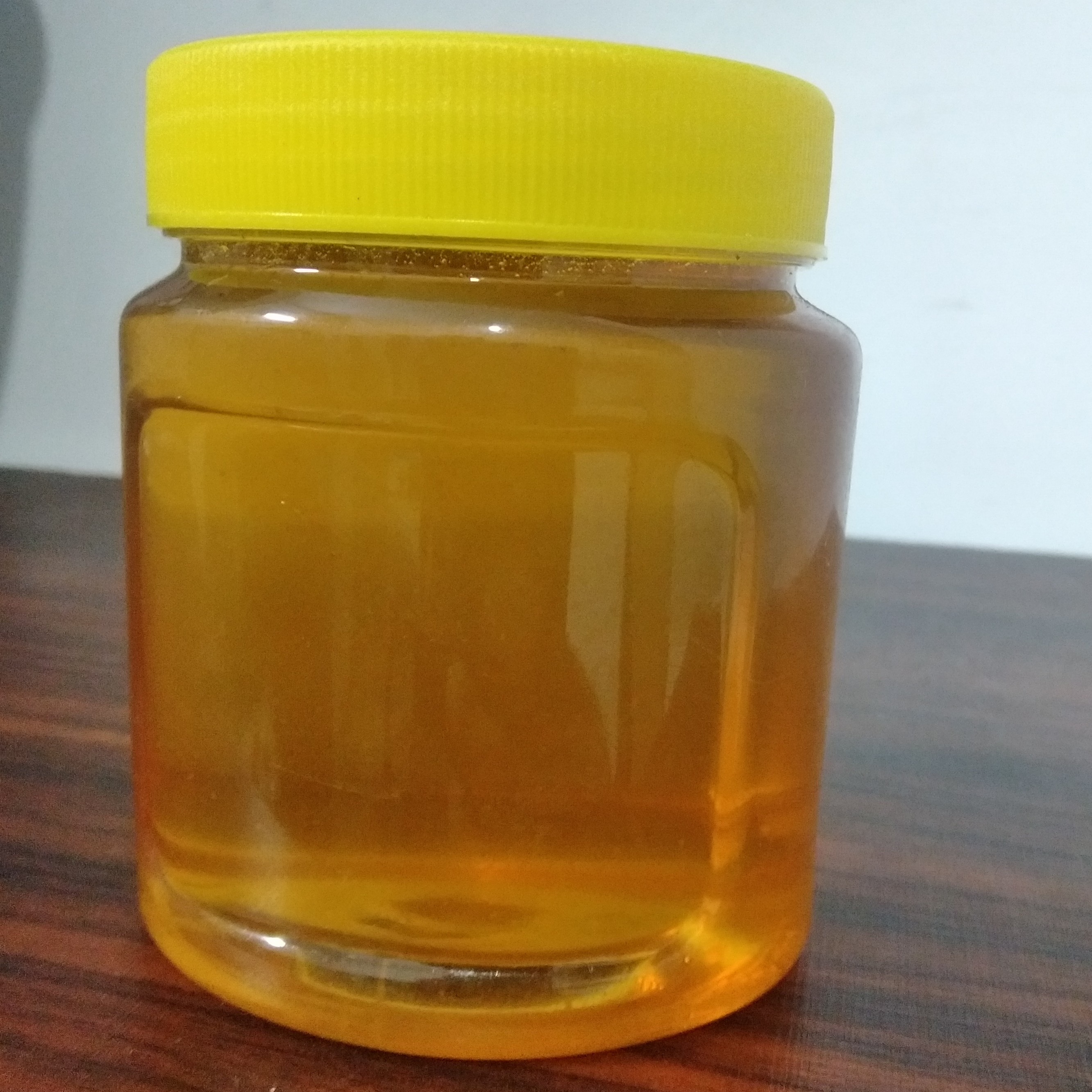 عسل چهل گیاه طبیعی و خالص بدون موم