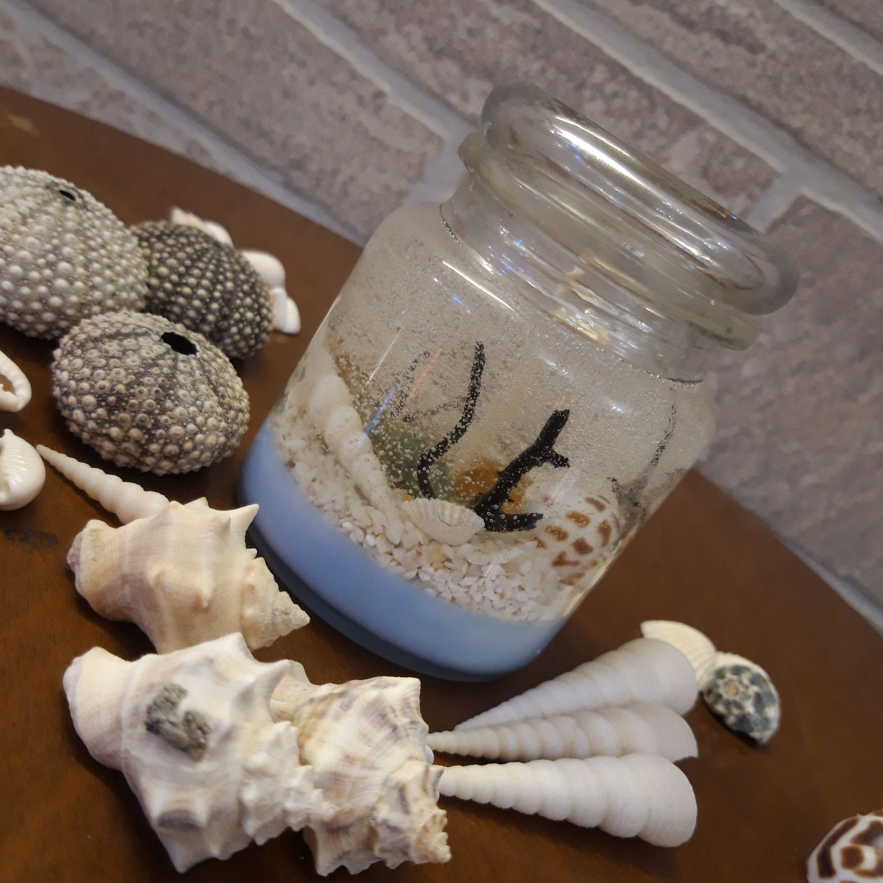 شمع شیشه ای بانکه طرح دریایی پارافین ژله ای