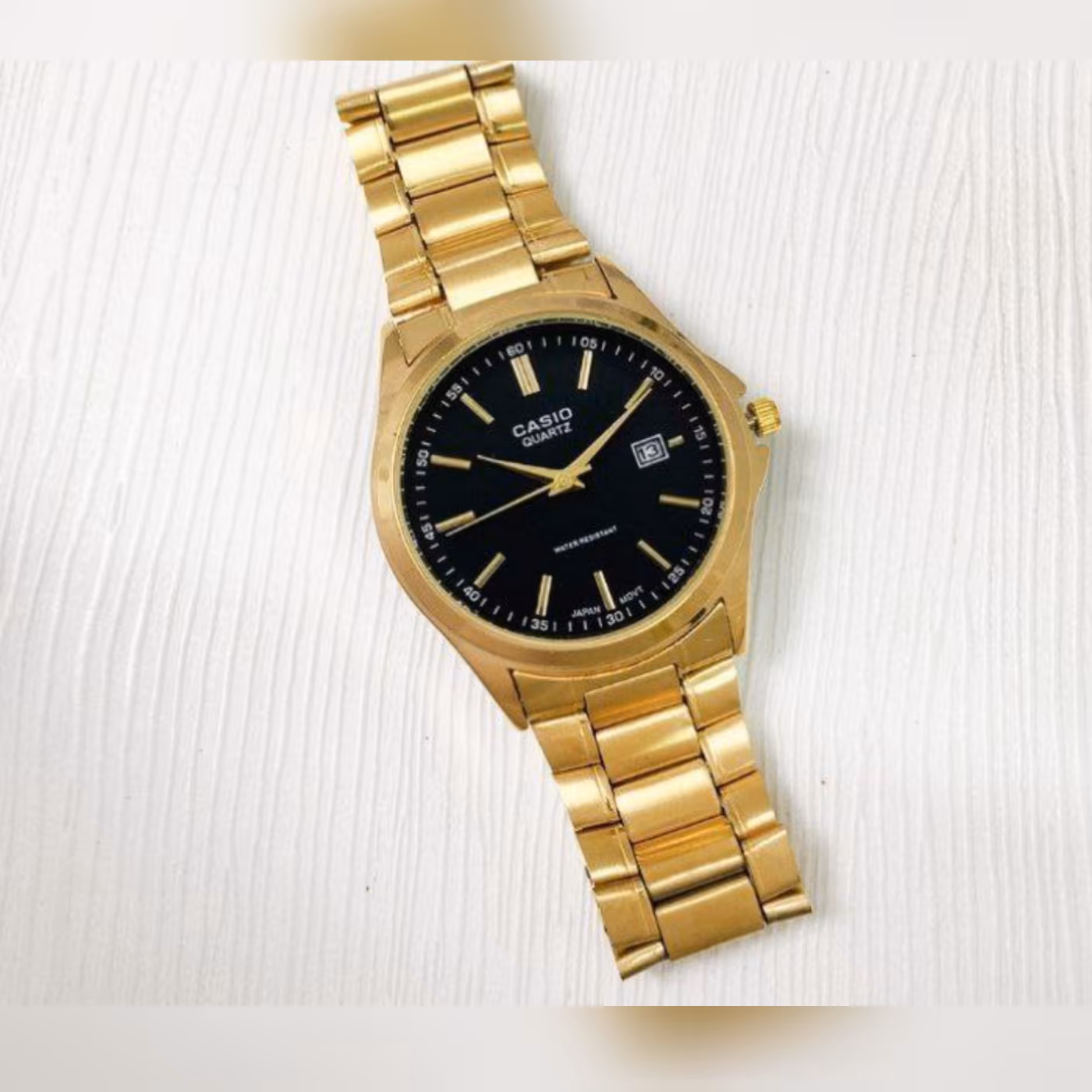 ساعت کاسیو  زنانه  مردانه  ساعت  بند استیل  طلایی   ساعت صفحه مشکی  ست زنانه مردانه 