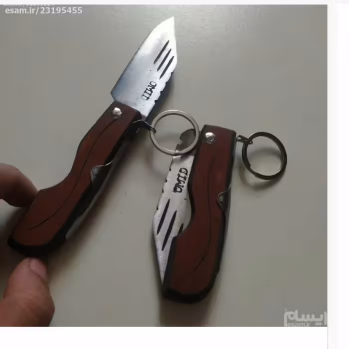چاقو جیبی   ضامن دار 18سانتی مارک امید دسته چوبی  ساخته شده از فنر تایلندی