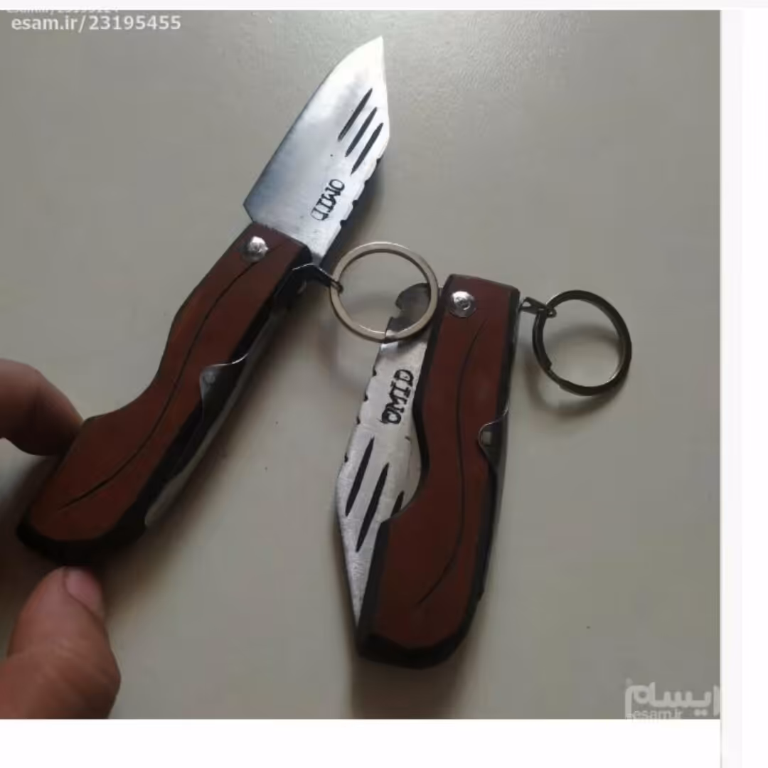 چاقو جیبی   ضامن دار 18سانتی مارک امید دسته چوبی  ساخته شده از فنر تایلندی