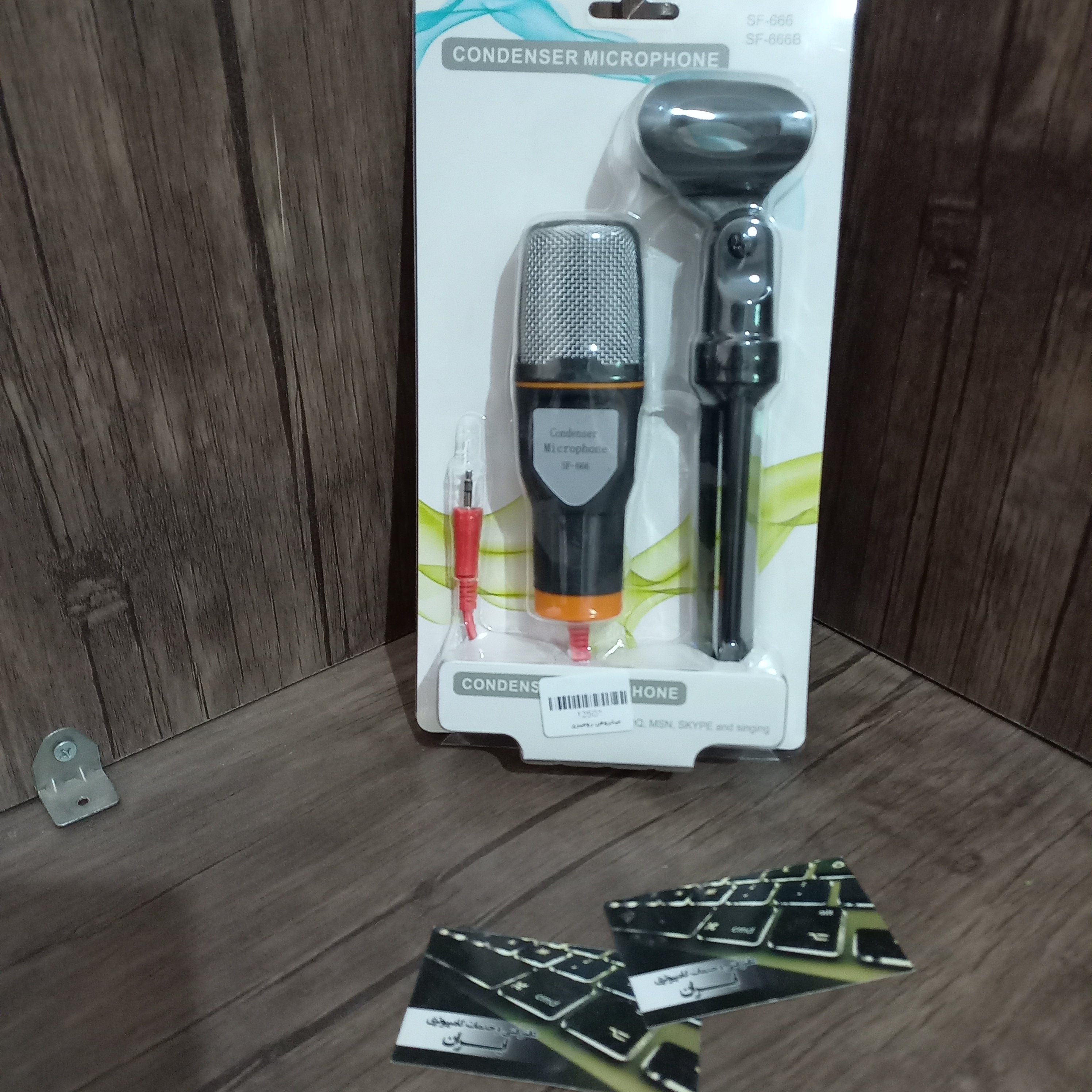 میکروفن رومیزیSF-666 رنگ مشکی طول کابل حدود 2 متر دارای سه پایه