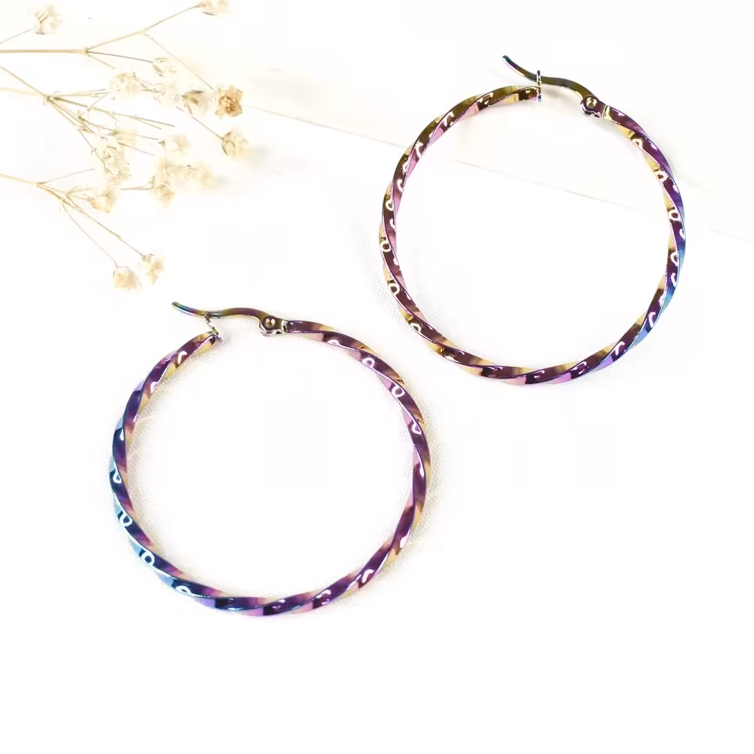 گوشواره استیل هولوگرامی دور دالبری کد 8303