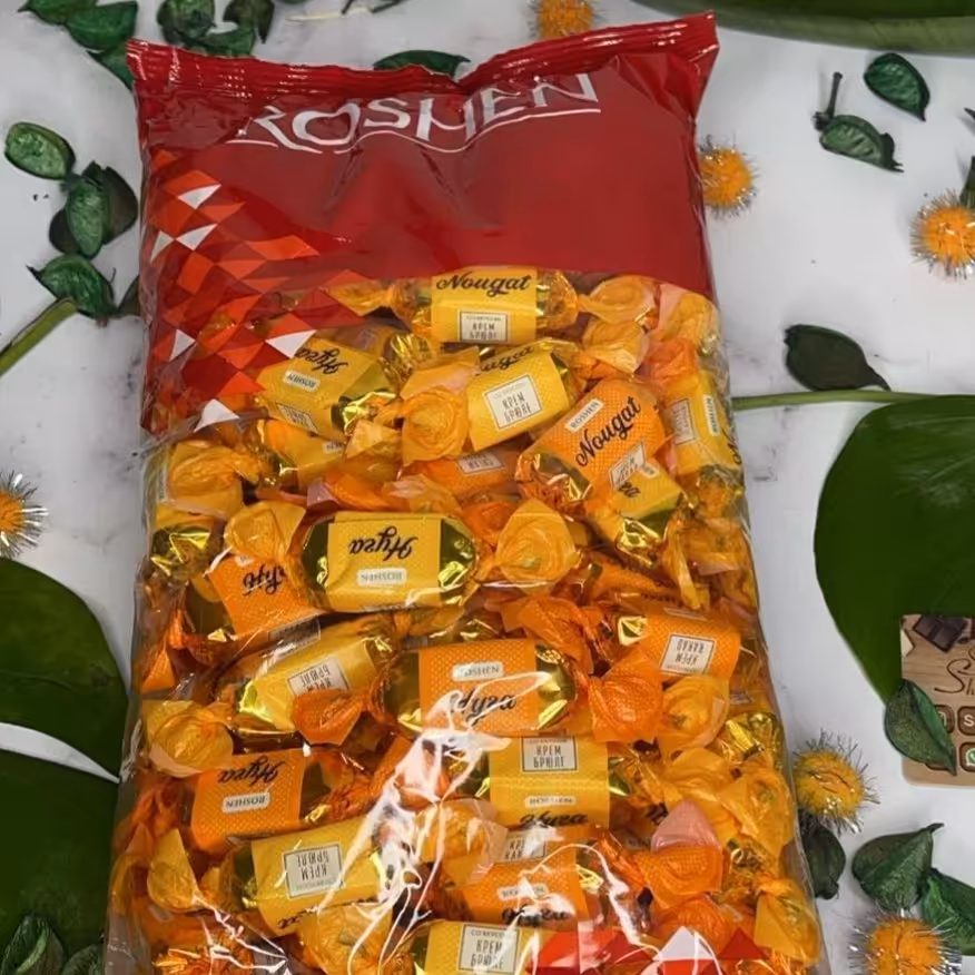 شکلات کندی نات نوقا با طعم پرتغال لیمو روشن بسته 1 کیلویی