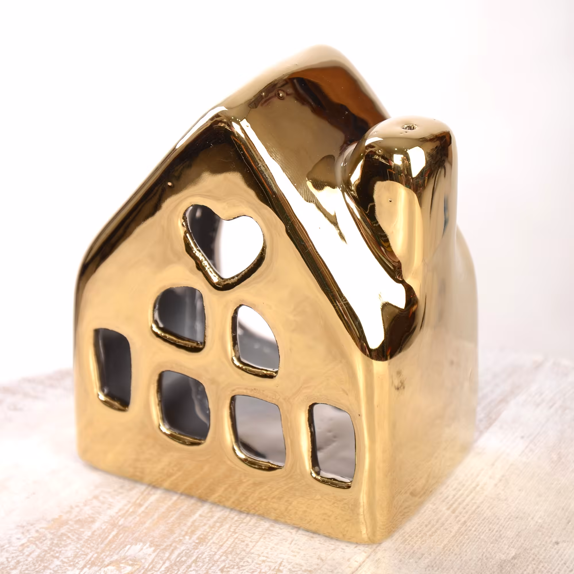 جا شمعی وارمر سرامیکی مدل کلبه با رنگ ثابت  طلایی براق کد 2