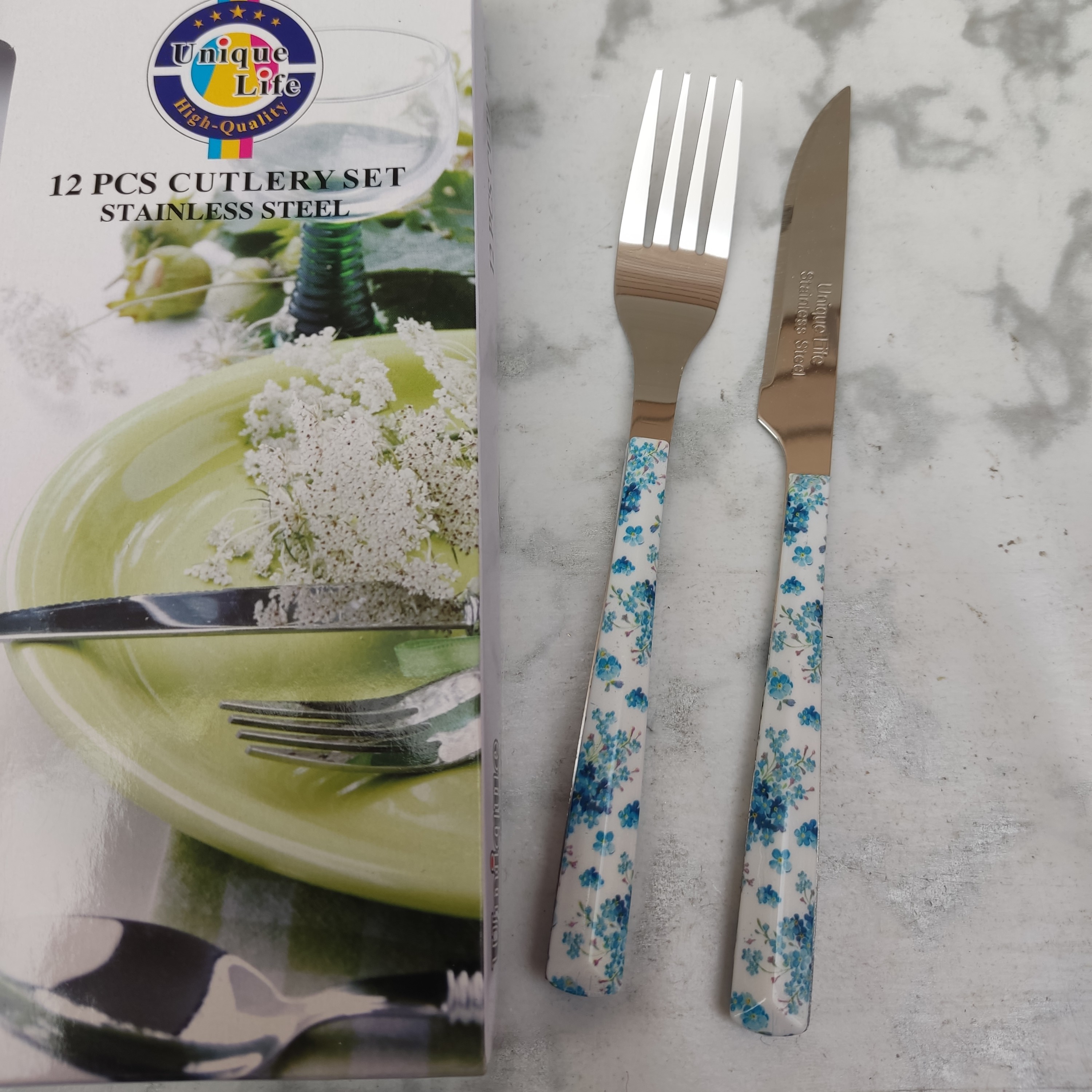 کارد و چنگال میوه خوری طرح سرامیکی مارک یونیک تیغه استیل 12 عددی 