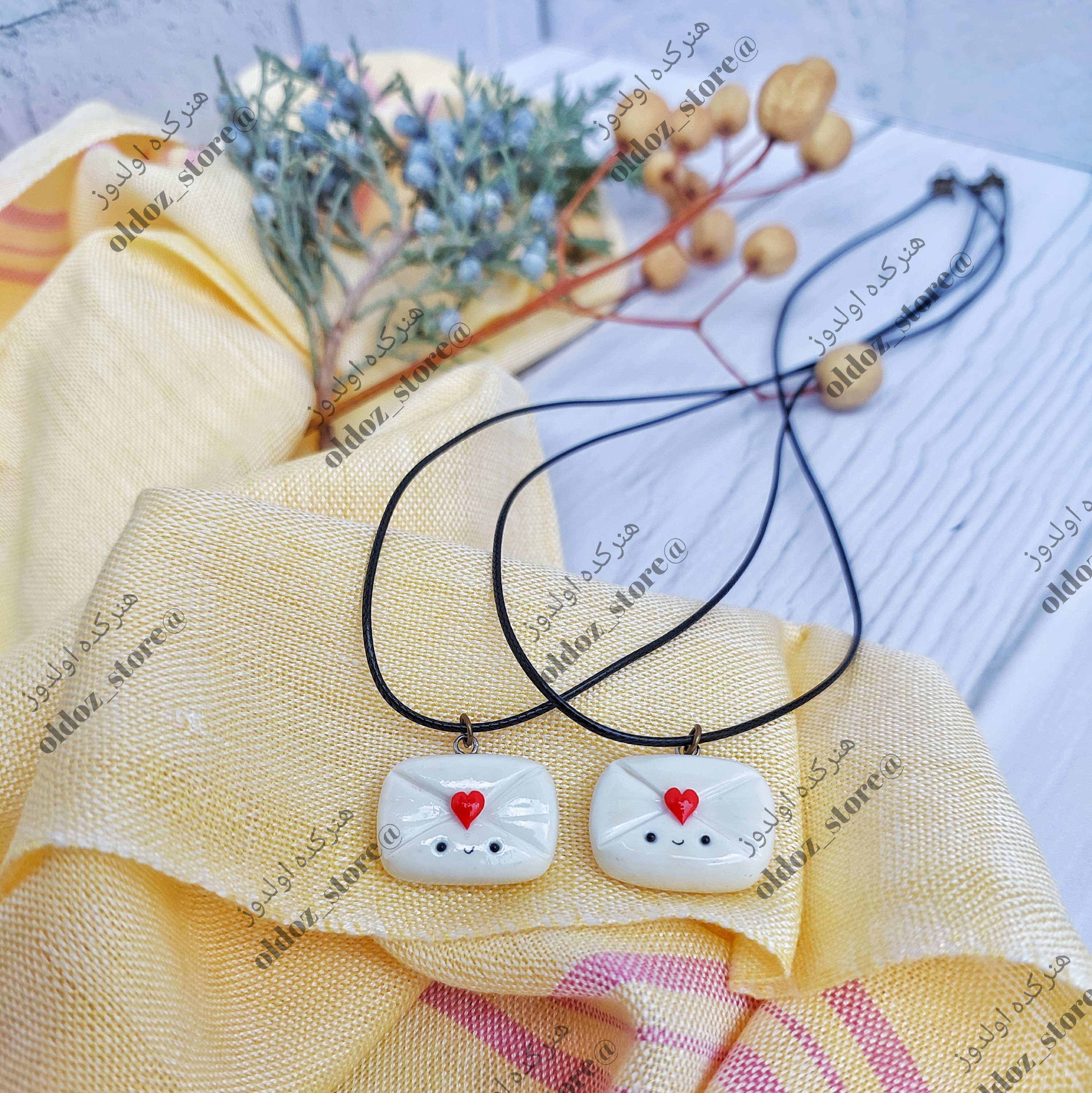 ست دوستی گردنبند طرح پاکت نامه
زیورالات