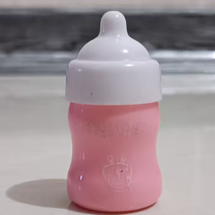 بالم لب بی رنگ شیشه شیر  صورتی رنگ 6 سانتی مجیک