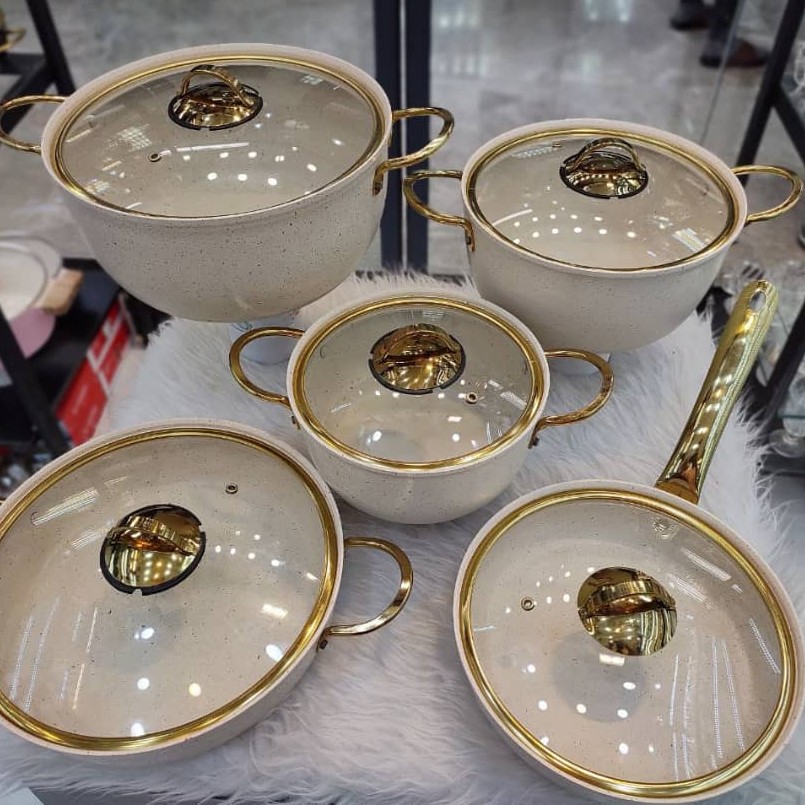 سرویس 10 پارچه .دستگیره استیل طلایی
.درب پیرکس رینگ استیل طلایی
.پوشش داخل و بیرون گرانیت 
.دیواره بلند .سنگین