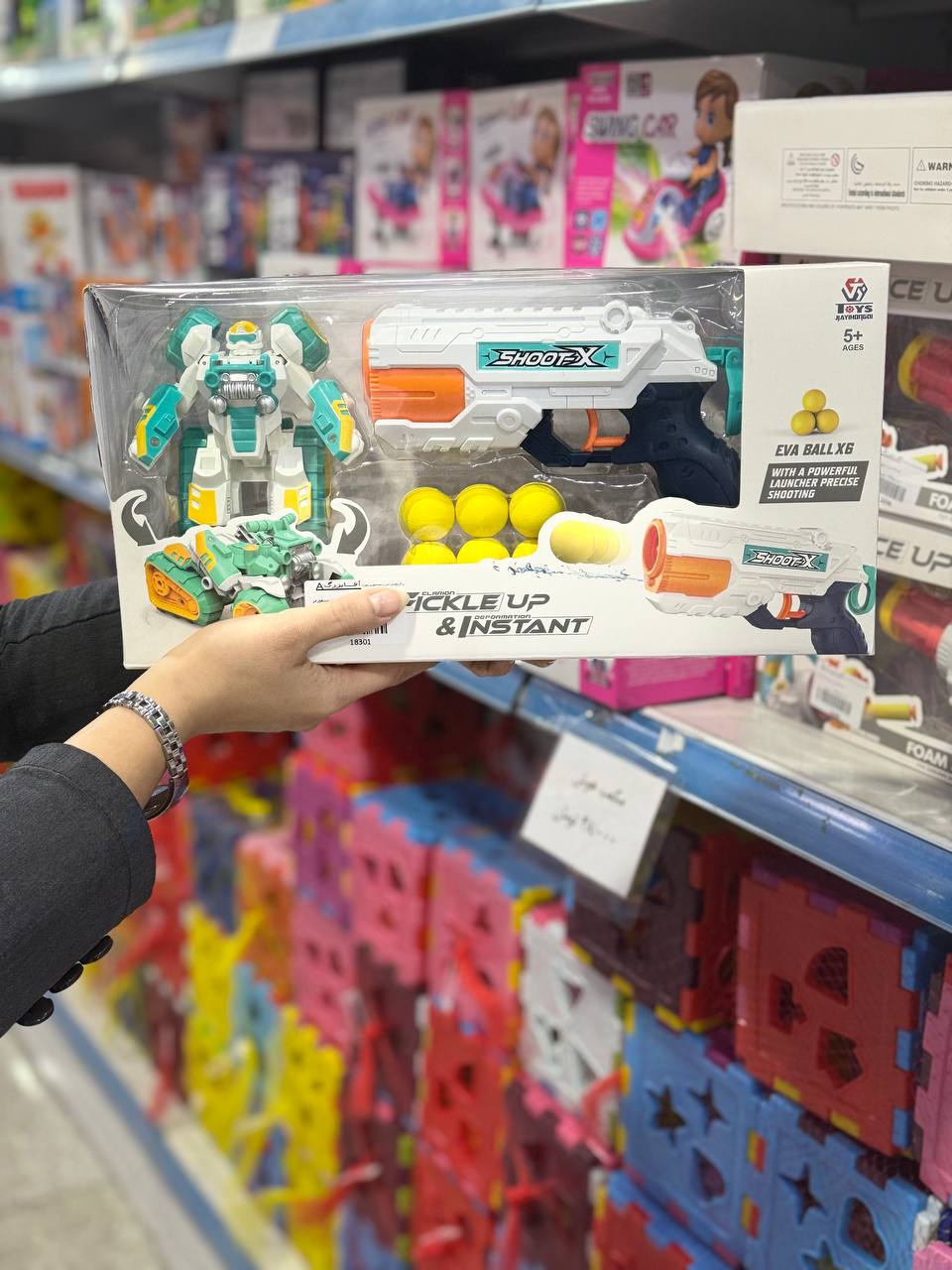 اسباب بازی تفنگ 2 کاره توپ پرتابی و آب پاش به همراه ربات تبدیل شونده مدل 56-648