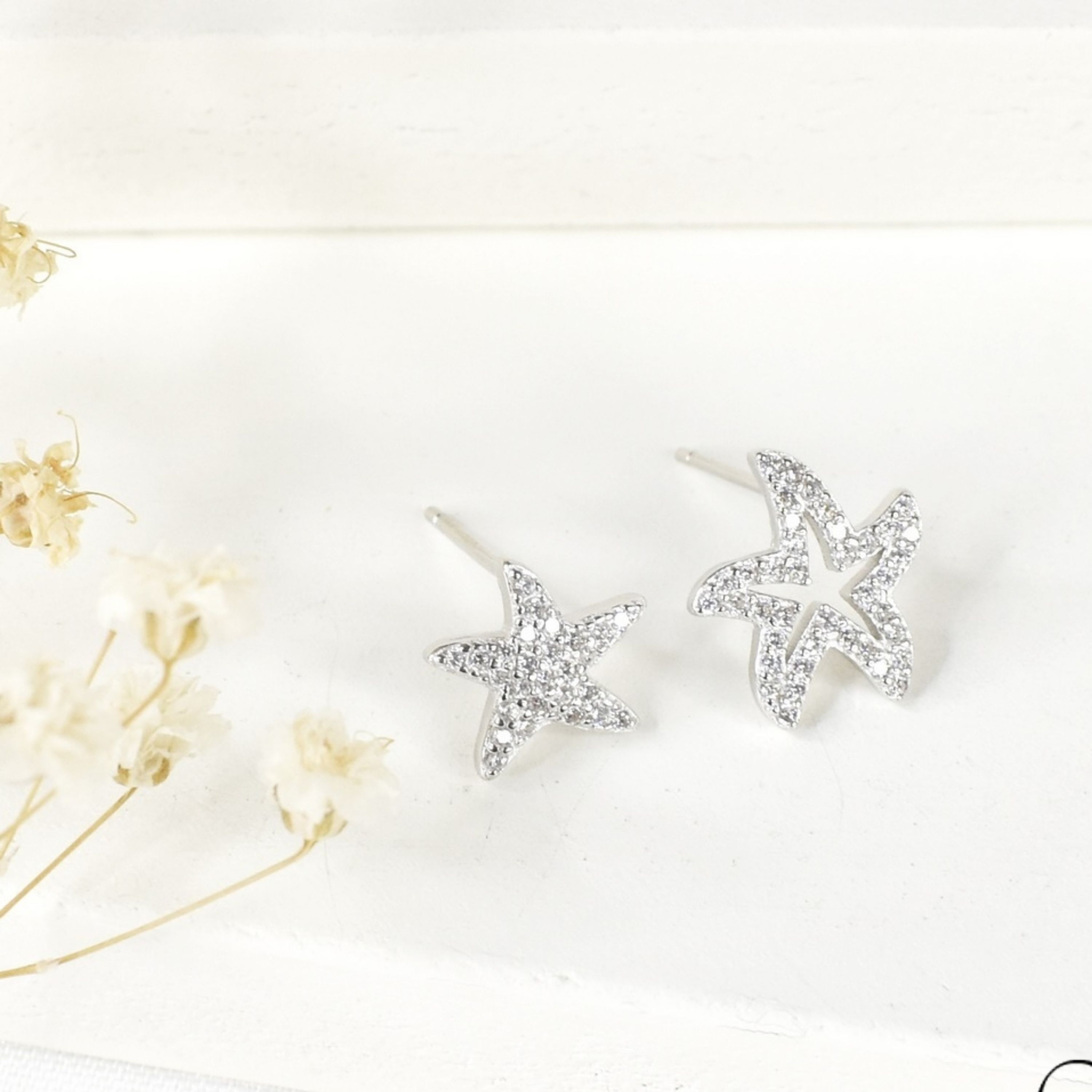 گوشواره نقره 925 طرح ستاره دریایی رنگ ثابت طرح طلا کد6719
